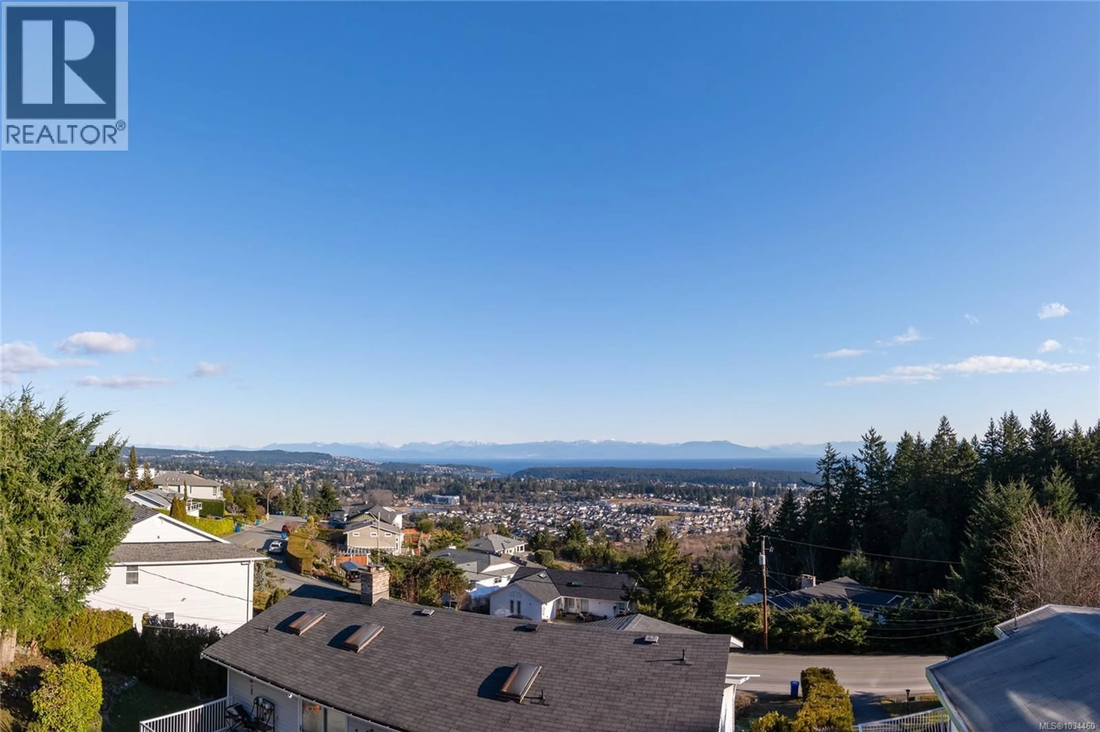 A pic from outside/outdoor area/front of a property/back of a property/a pic from drone, mountain view for 1085 COLLEGE DRIVE, Nanaimo British Columbia V9R5V5