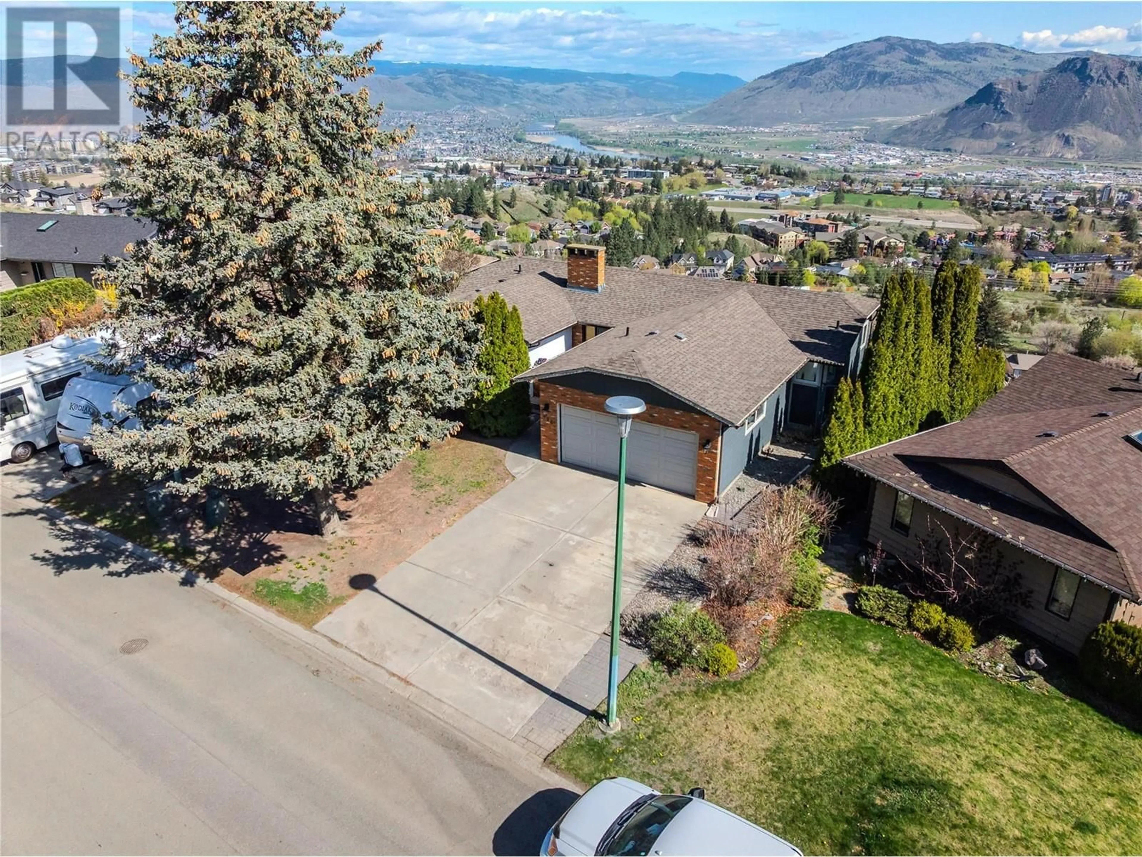 A pic from outside/outdoor area/front of a property/back of a property/a pic from drone, mountain view for 396 GLENEAGLES DRIVE, Kamloops British Columbia V2E1Z4