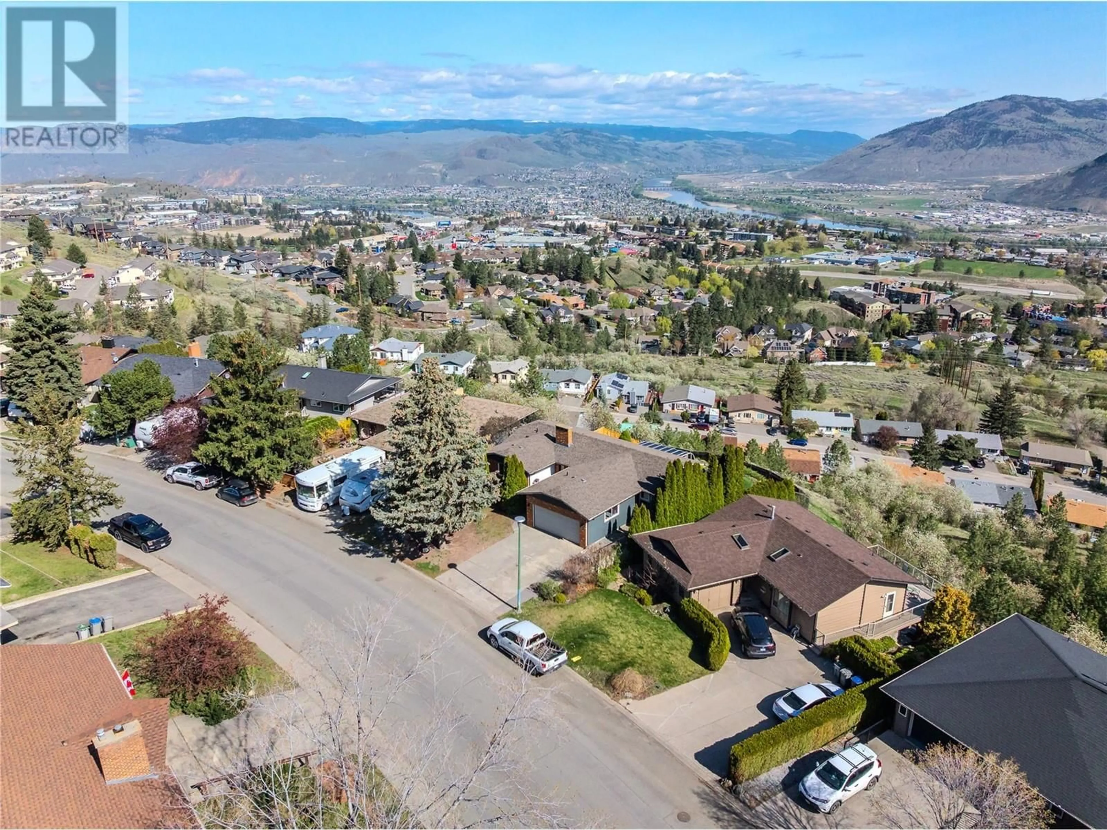 A pic from outside/outdoor area/front of a property/back of a property/a pic from drone, mountain view for 396 GLENEAGLES DRIVE, Kamloops British Columbia V2E1Z4