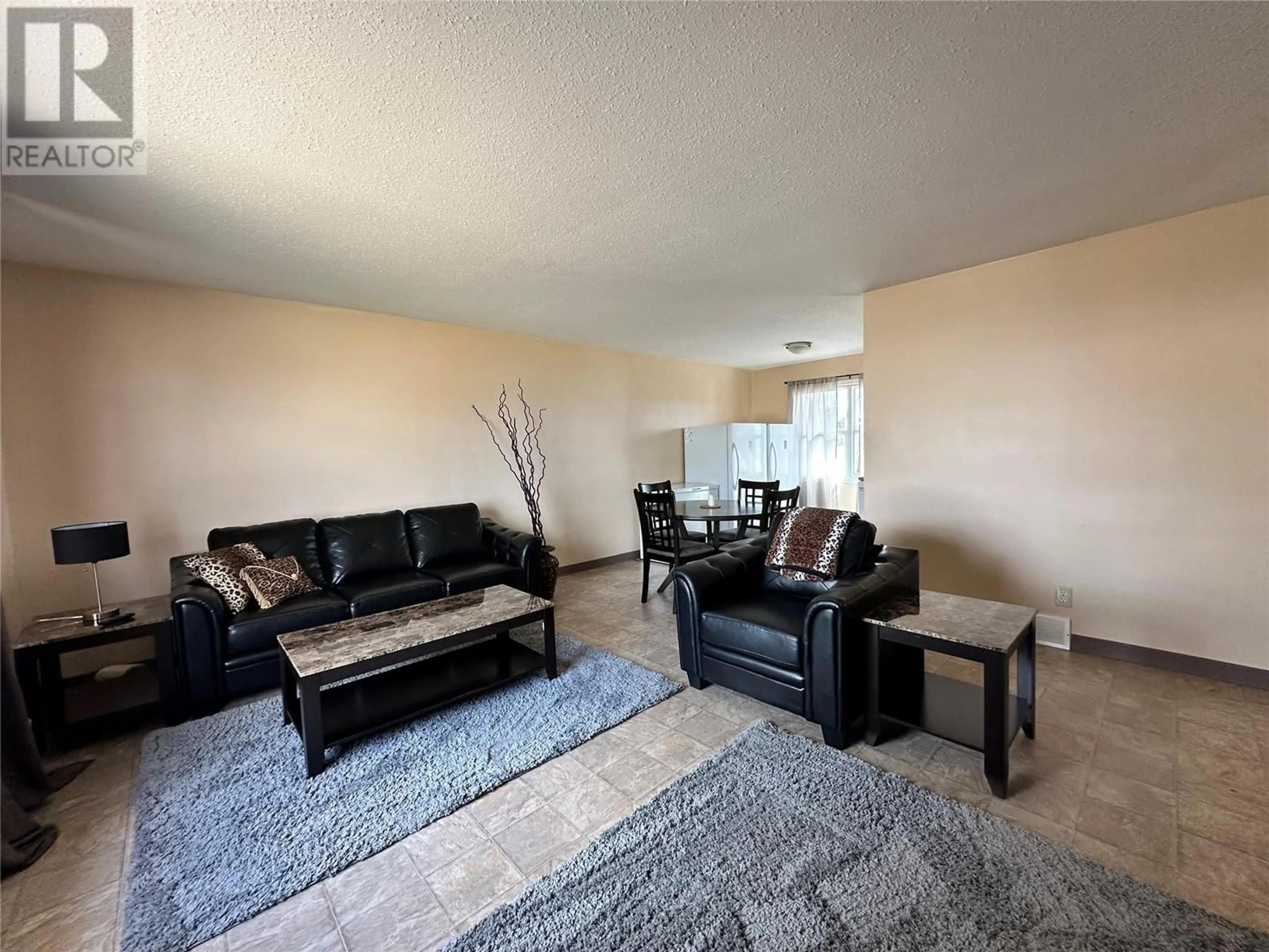 Living room with furniture, unknown for 409 100 AVENUE, Dawson Creek British Columbia V1G1V6