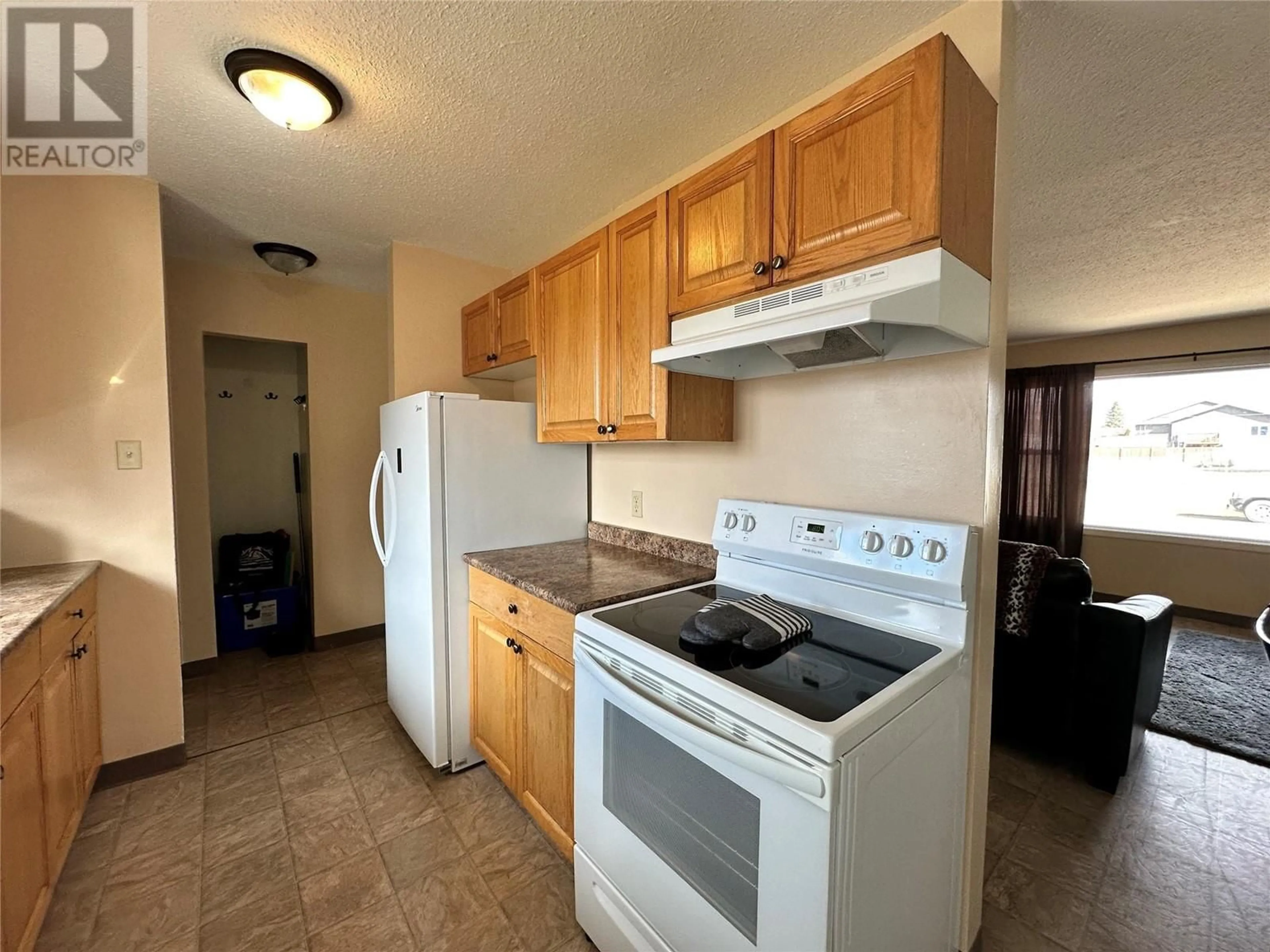 Standard kitchen, unknown for 409 100 AVENUE, Dawson Creek British Columbia V1G1V6
