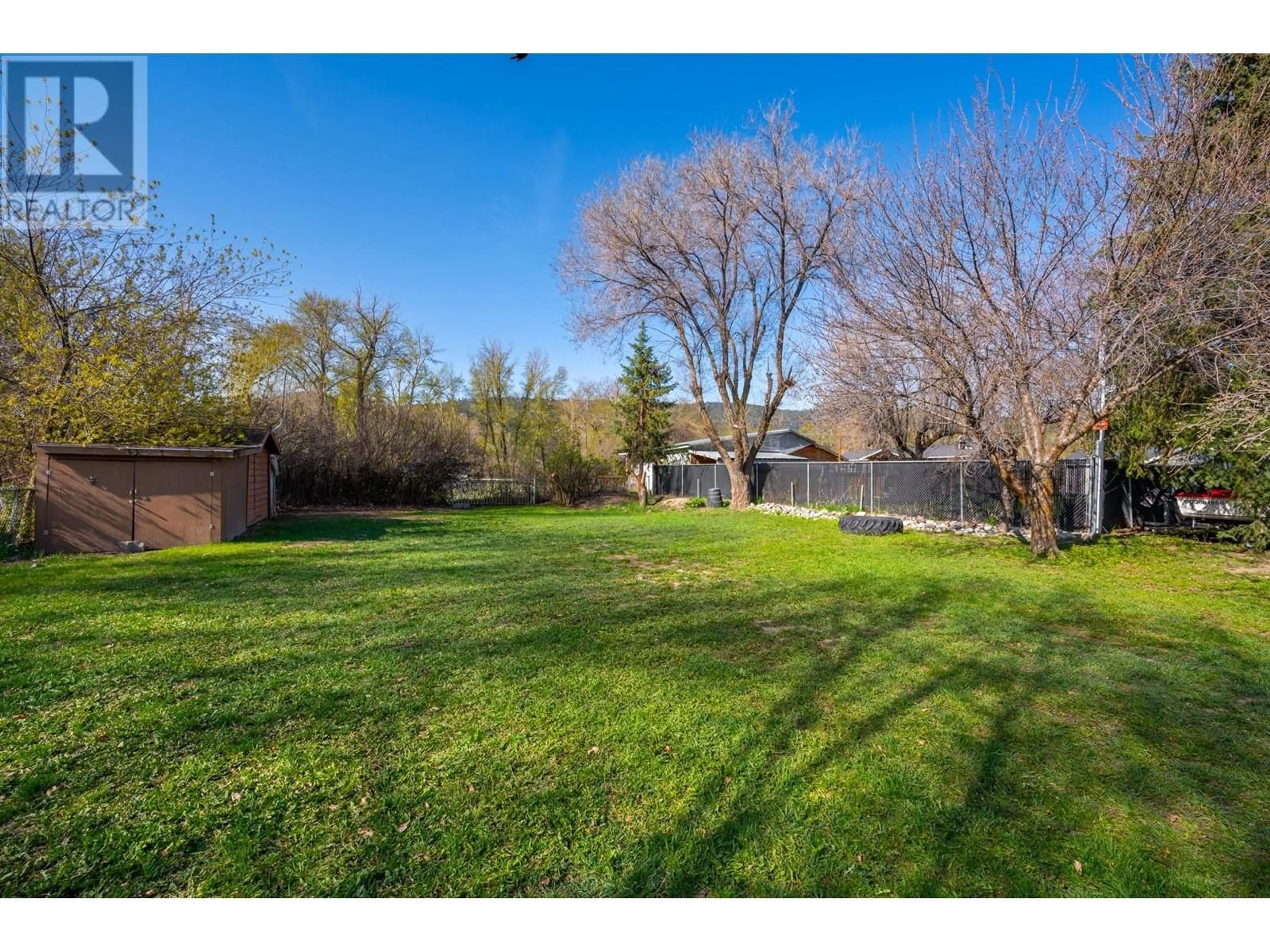 A pic from outside/outdoor area/front of a property/back of a property/a pic from drone, street for 1876 HAMILTON AVENUE, Merritt British Columbia V1K1B8