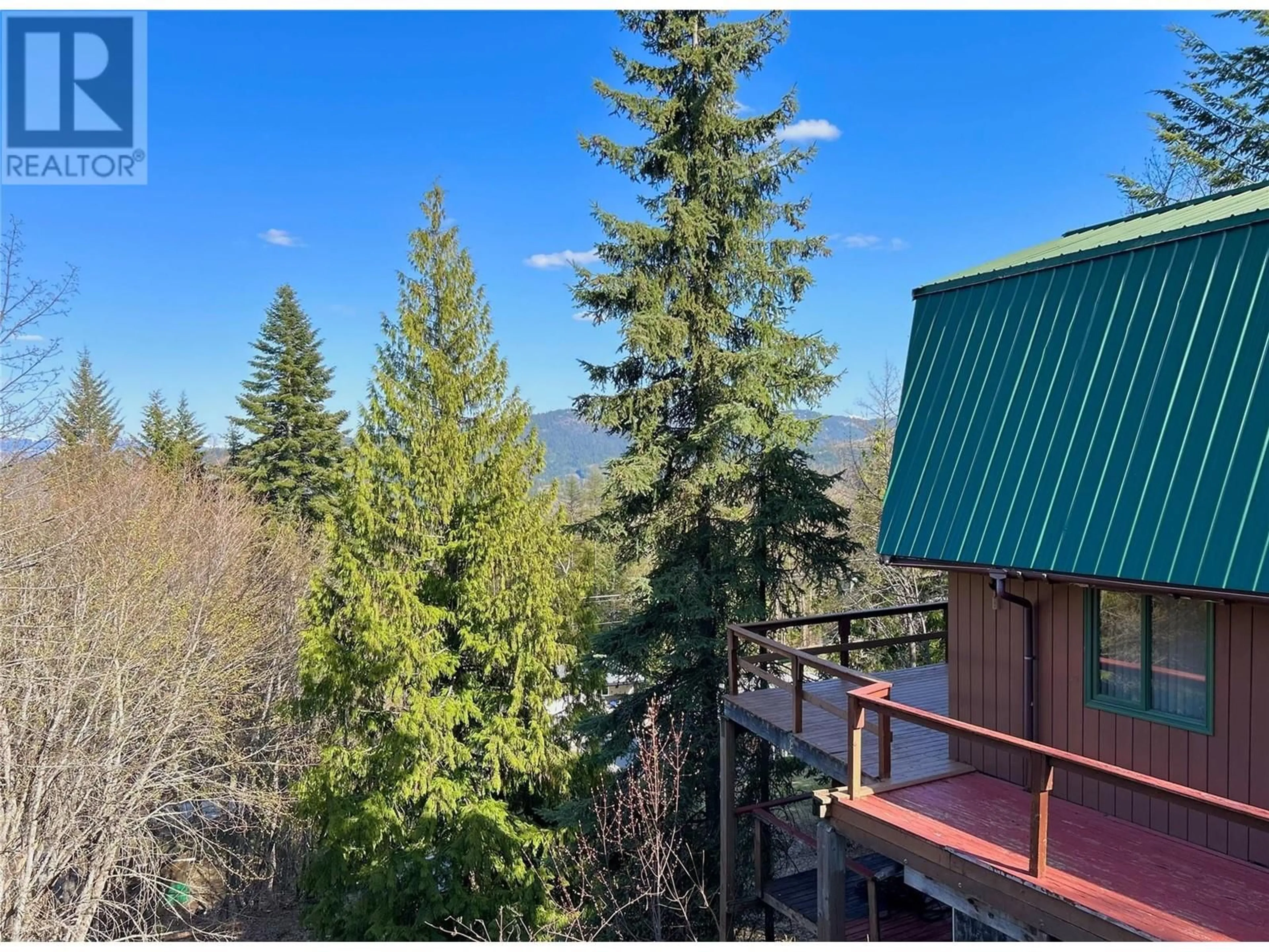 A pic from outside/outdoor area/front of a property/back of a property/a pic from drone, forest/trees view for 2160 LOWER GEORGIA STREET, Rossland British Columbia V0G1Y0