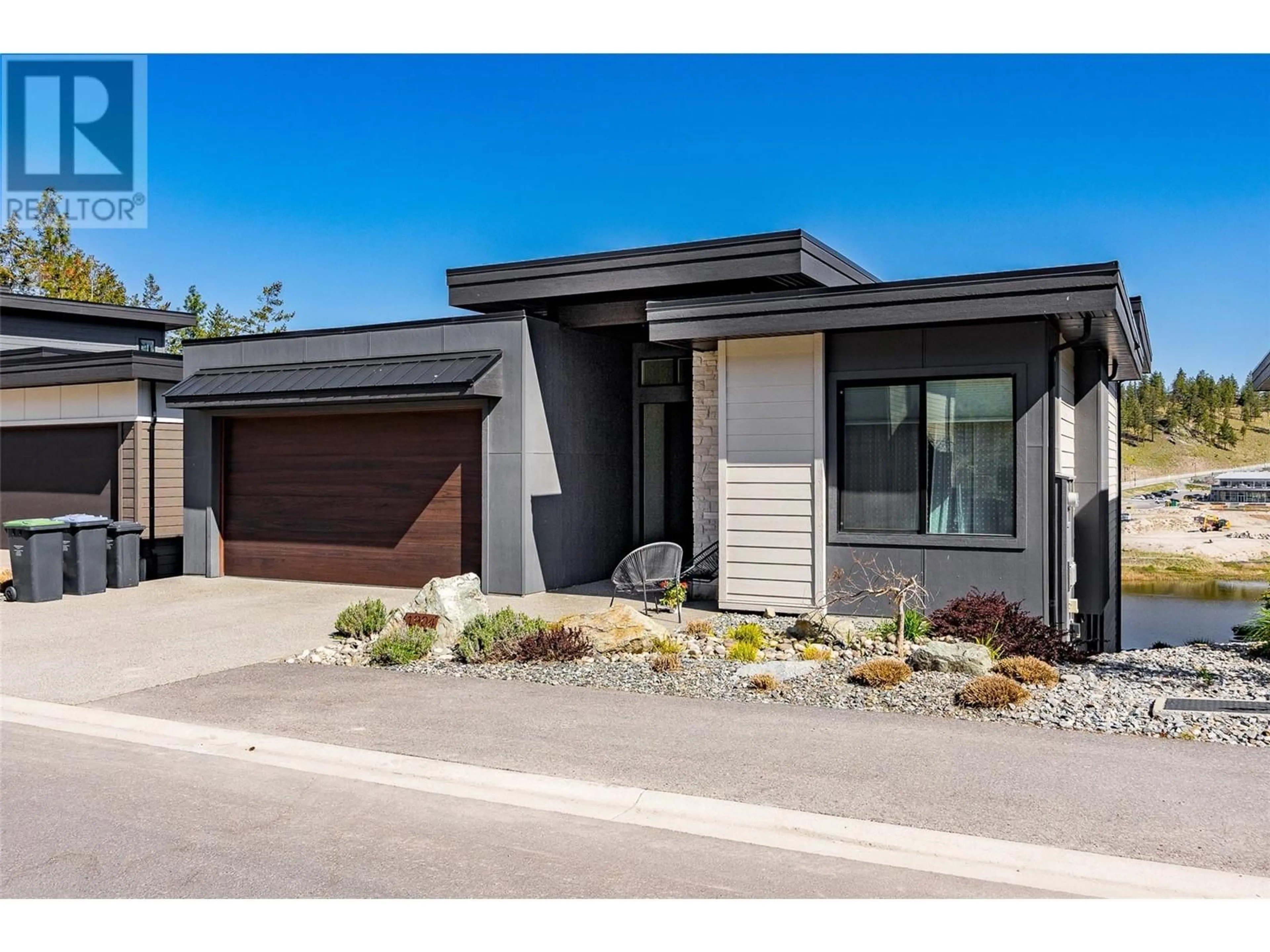 Home with brick exterior material, street for 1904 NORTHERN FLICKER COURT, Kelowna British Columbia V1V0G3