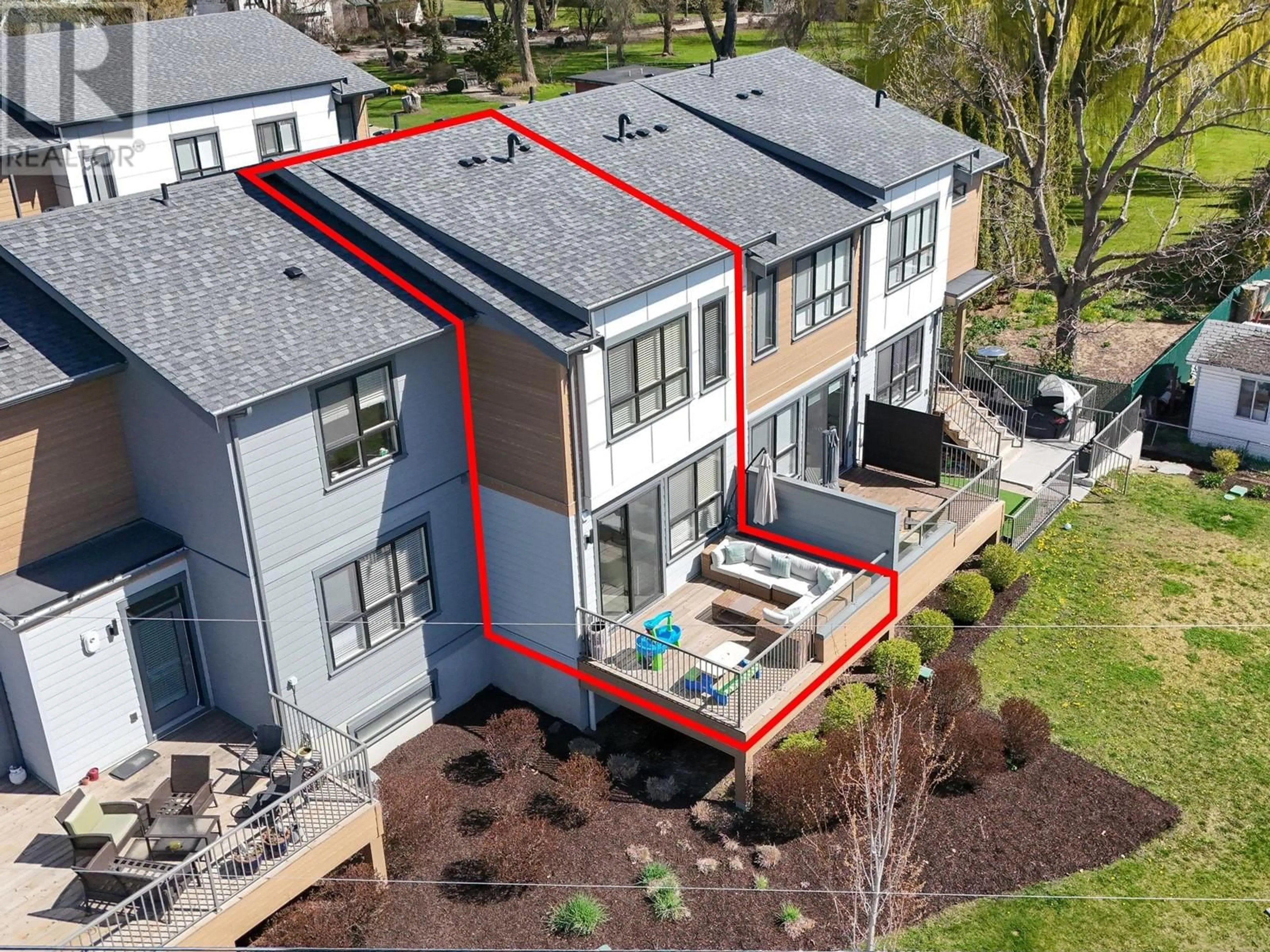 A pic from outside/outdoor area/front of a property/back of a property/a pic from drone, unknown for 403 - 11581 ROGERS ROAD, Lake Country British Columbia V4V1X8