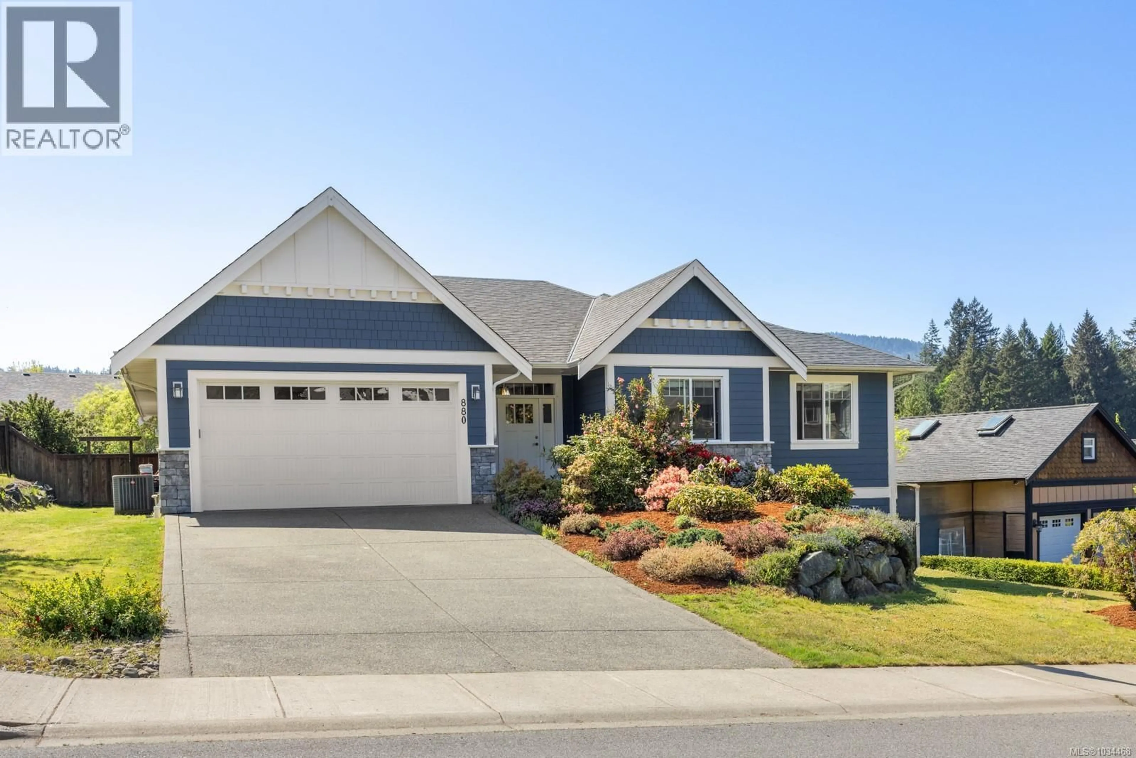 Home with vinyl exterior material, street for 880 PRATT ROAD, Mill Bay British Columbia V8H1H6