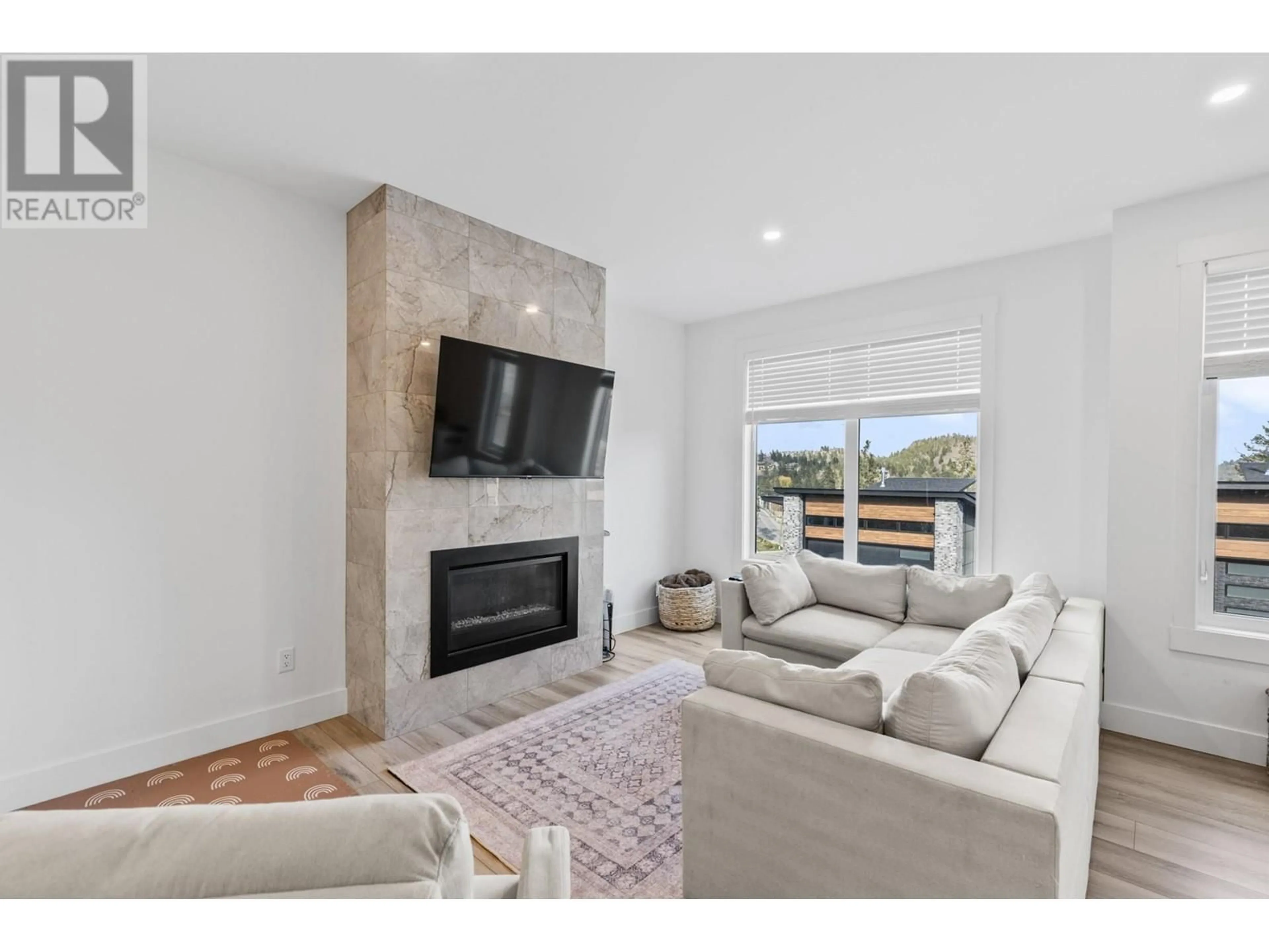 Living room with furniture, ceramic/tile floor for 25 - 2835 CANYON CREST DRIVE, West Kelowna British Columbia V4T0E3