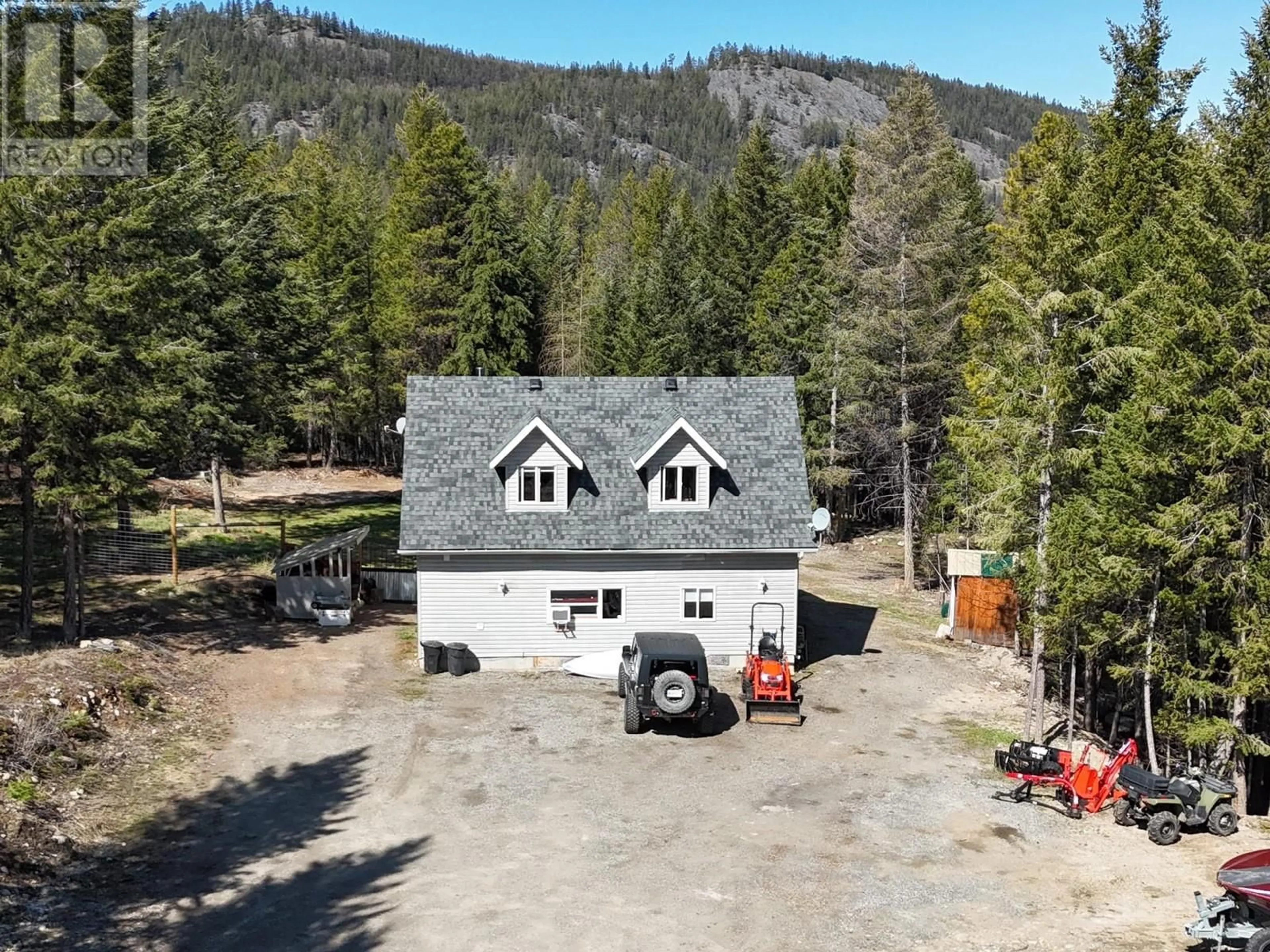 A pic from outside/outdoor area/front of a property/back of a property/a pic from drone, mountain view for 2045 HARRIS ROAD, Cranbrook British Columbia V1C6V3