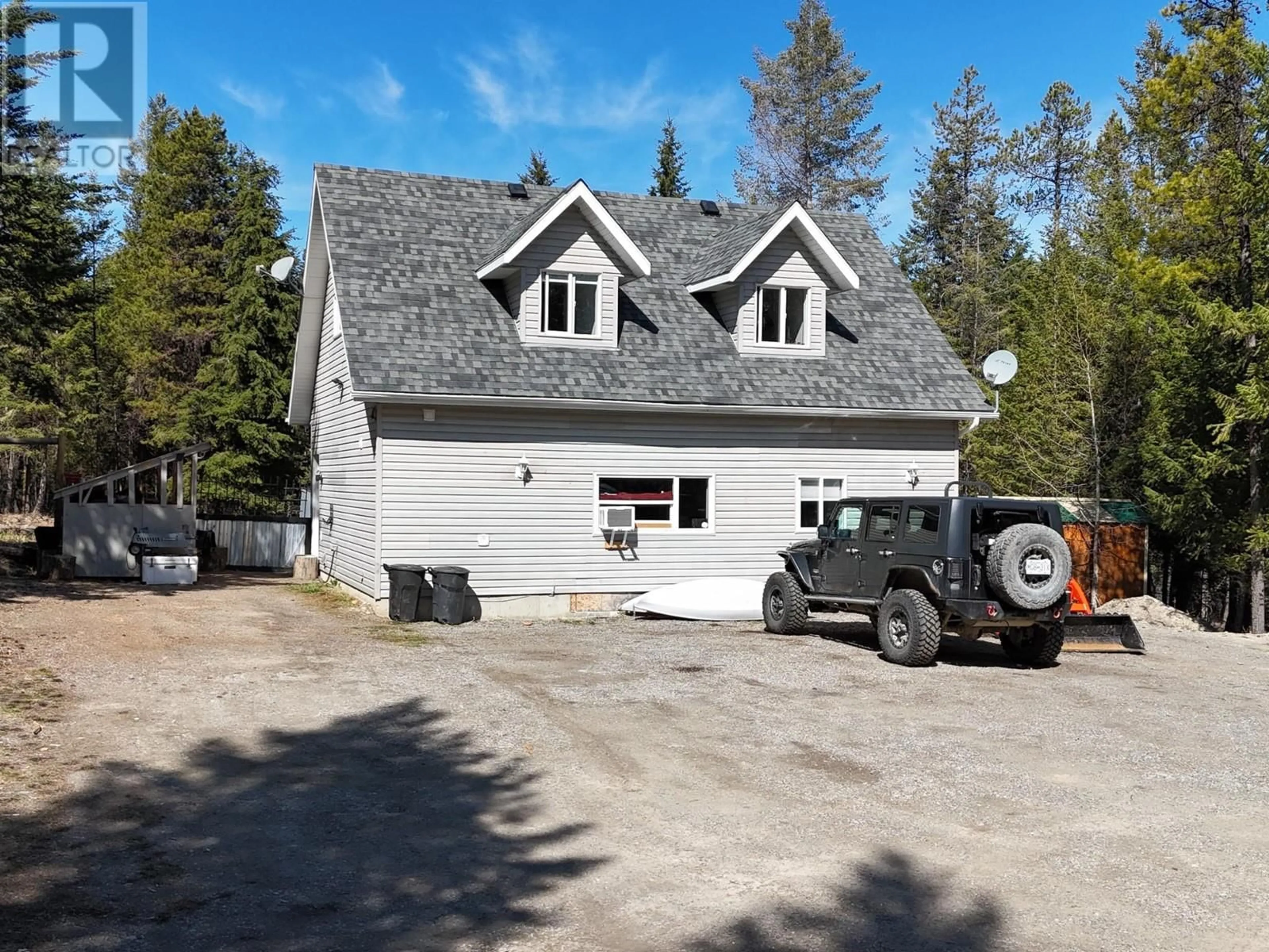 A pic from outside/outdoor area/front of a property/back of a property/a pic from drone, street for 2045 HARRIS ROAD, Cranbrook British Columbia V1C6V3