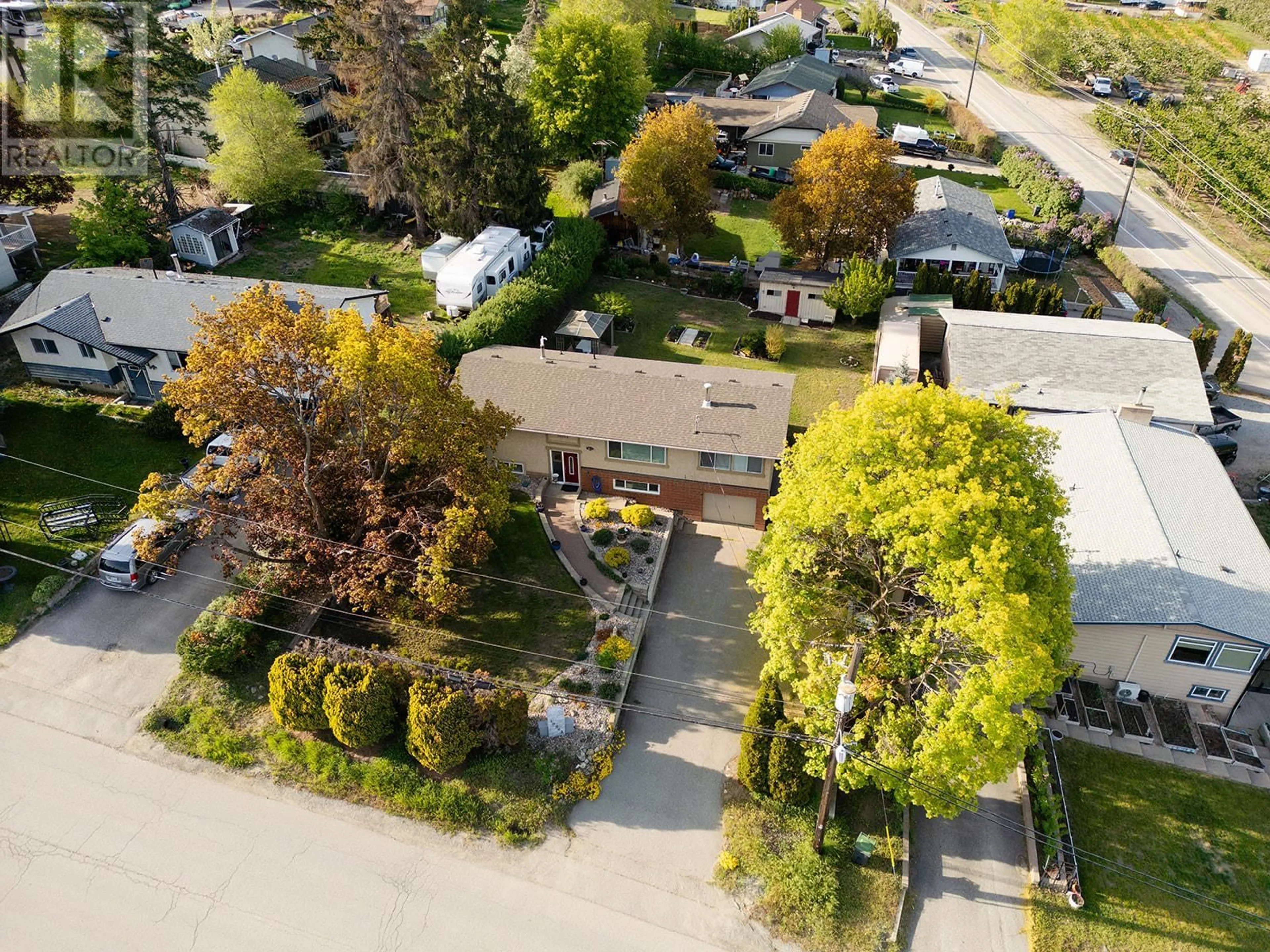 A pic from outside/outdoor area/front of a property/back of a property/a pic from drone, street for 10062 READ ROAD, Lake Country British Columbia V4V1L3