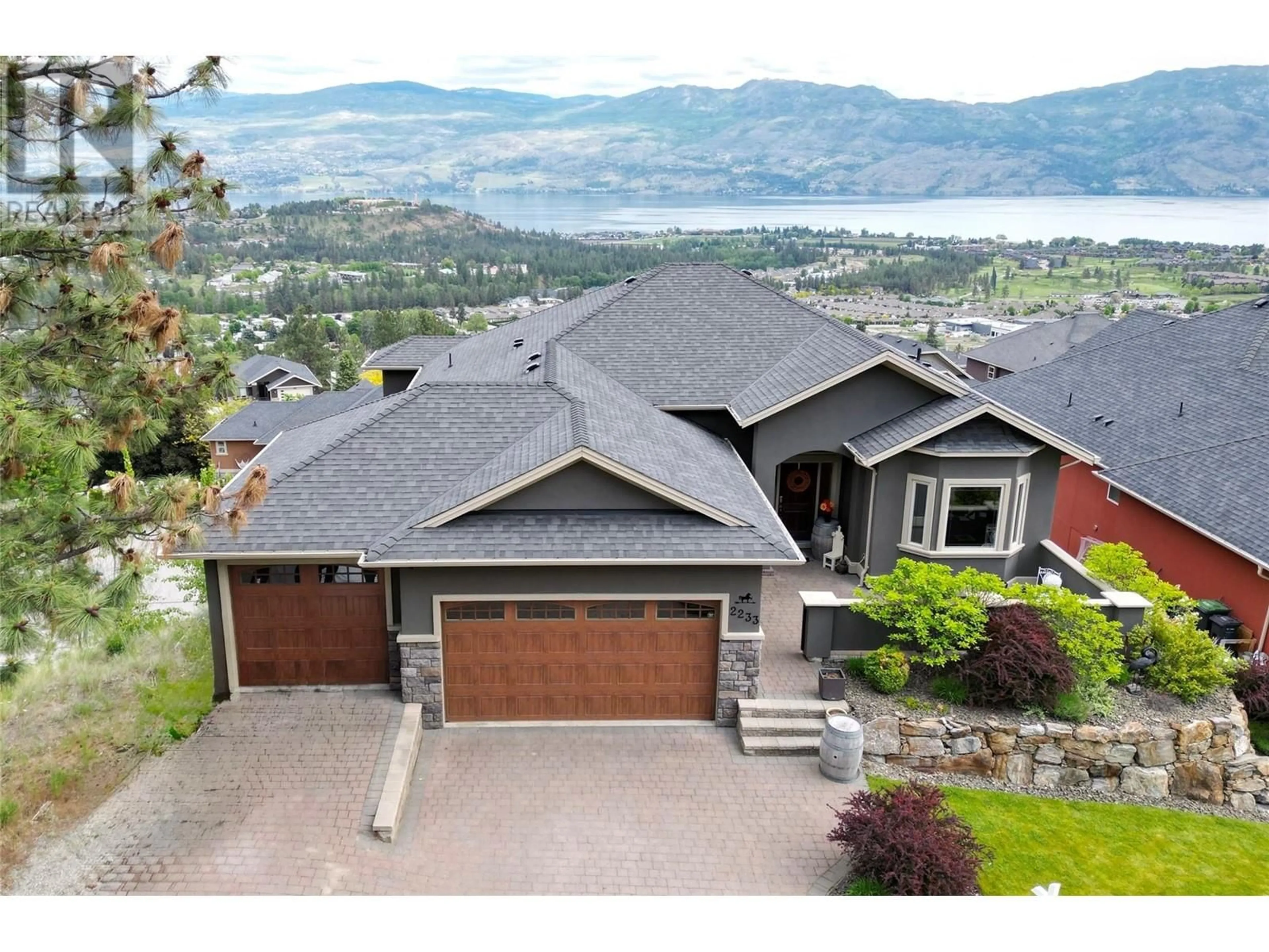 A pic from outside/outdoor area/front of a property/back of a property/a pic from drone, mountain view for 2233 HIHANNAH DRIVE, West Kelowna British Columbia V4T3C9