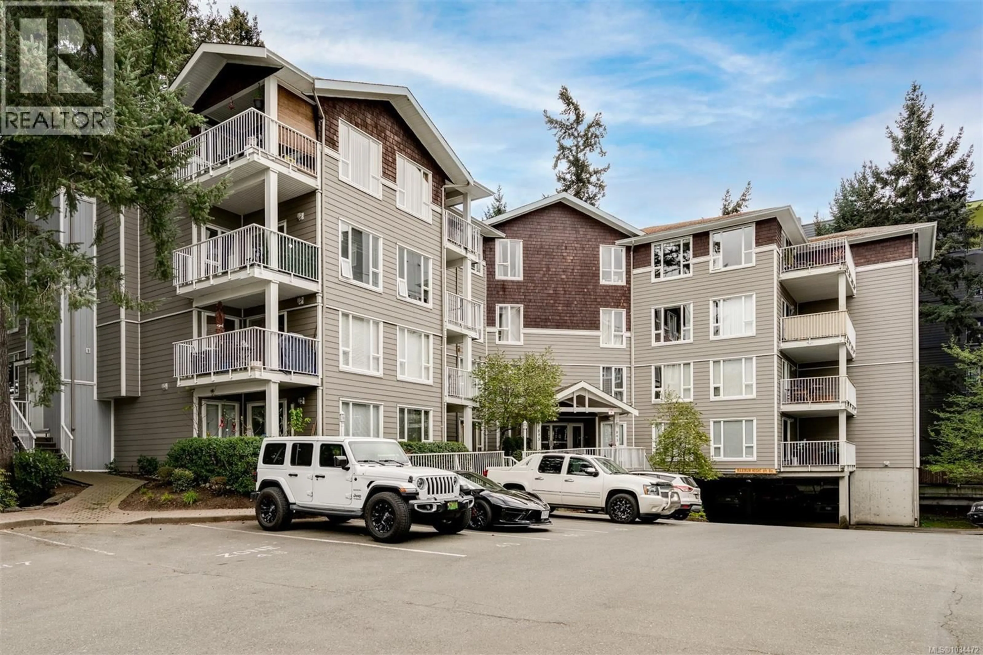 A pic from outside/outdoor area/front of a property/back of a property/a pic from drone, mountain view for 206 - 893 HOCKLEY AVENUE, Langford British Columbia V9B2V8