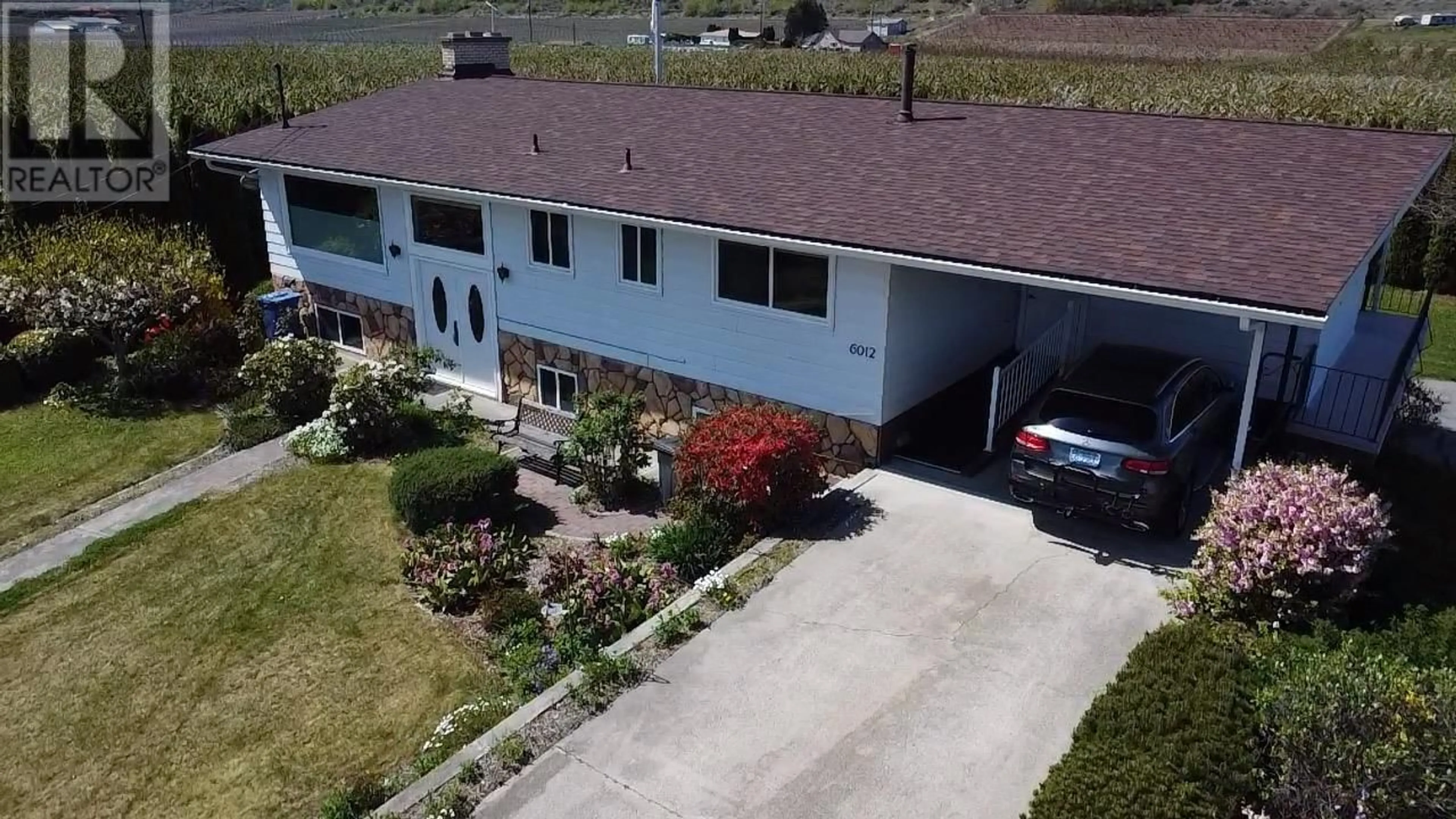 A pic from outside/outdoor area/front of a property/back of a property/a pic from drone, unknown for 6012 107TH STREET, Osoyoos British Columbia V0H1V2