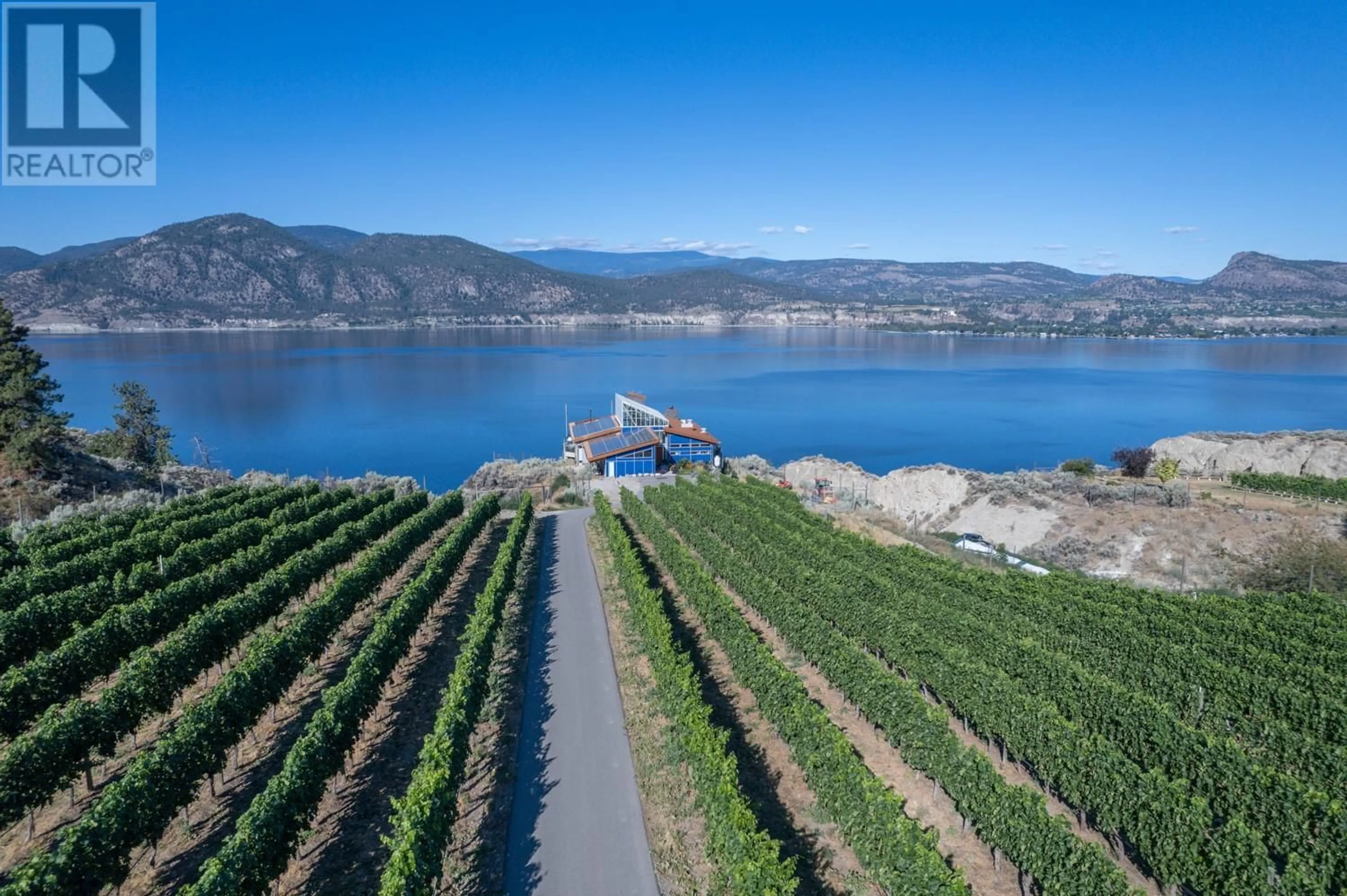 A pic from outside/outdoor area/front of a property/back of a property/a pic from drone, water/lake/river/ocean view for 2185 NARAMATA ROAD, Naramata British Columbia V0H1N0