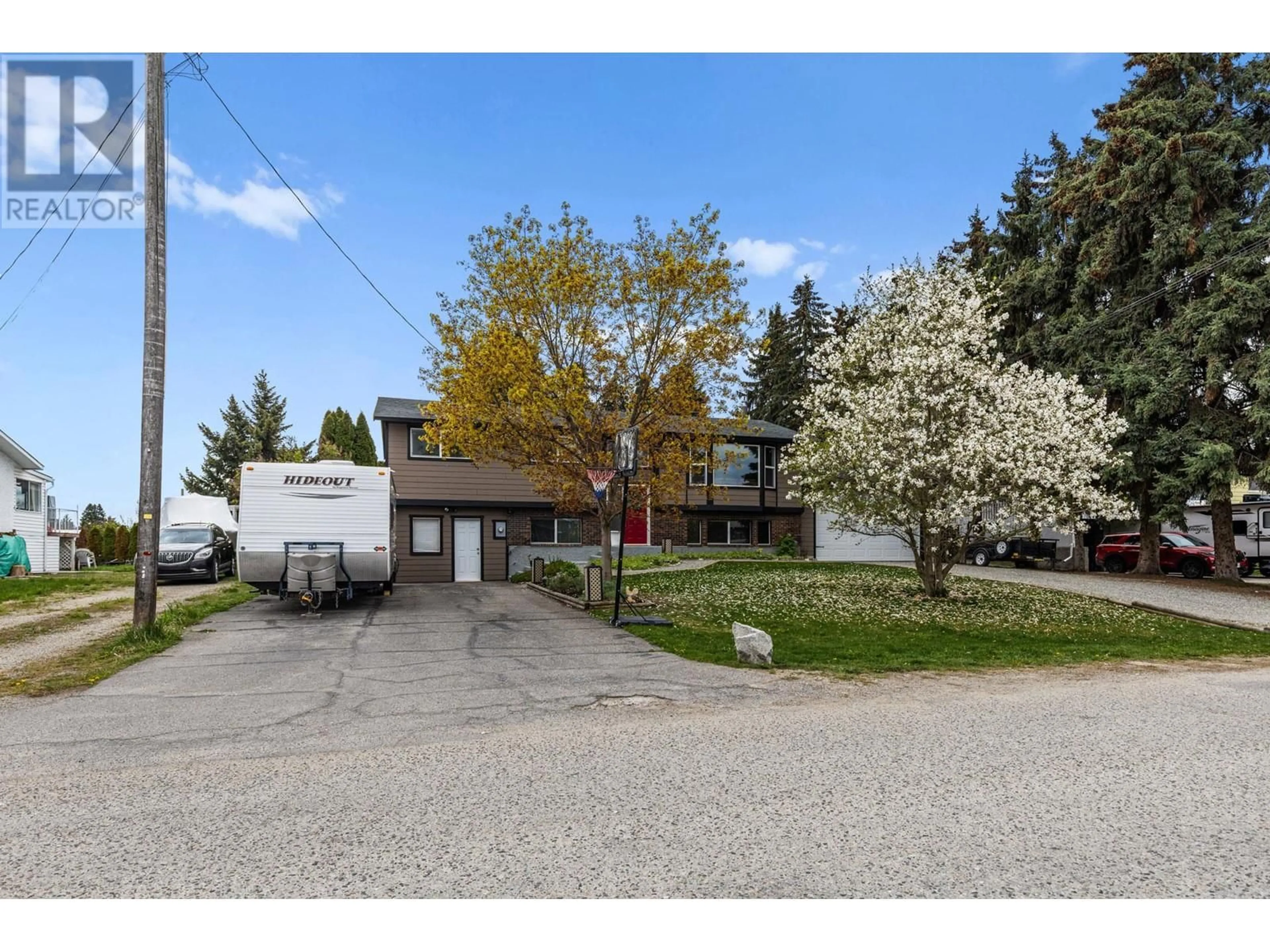 A pic from outside/outdoor area/front of a property/back of a property/a pic from drone, street for 10151 KEL VERN CRESCENT, Lake Country British Columbia V4V1L3