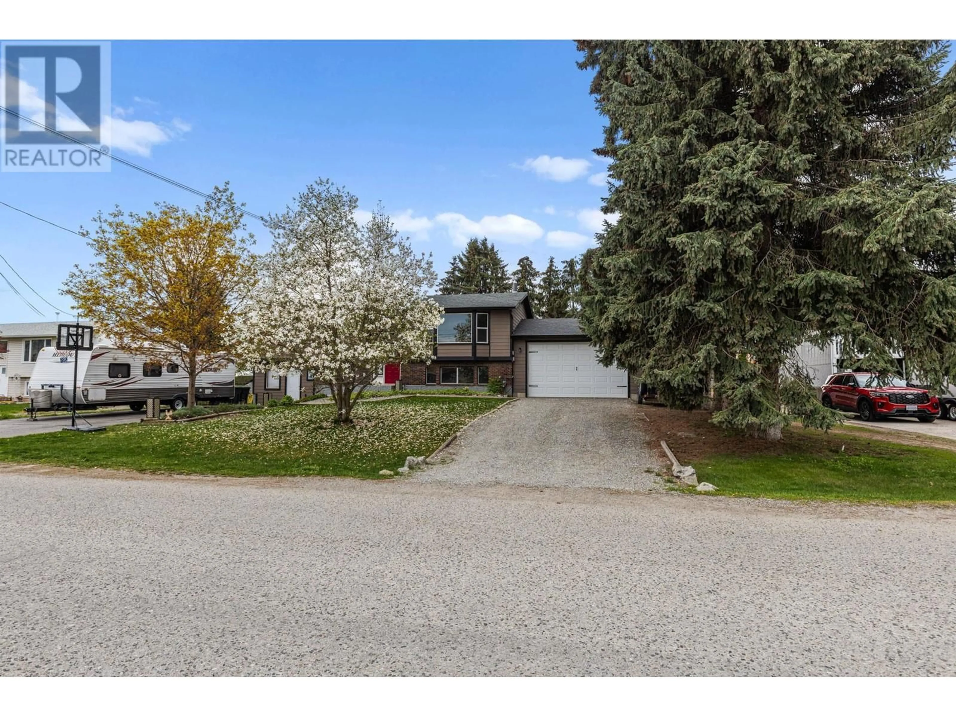 A pic from outside/outdoor area/front of a property/back of a property/a pic from drone, street for 10151 KEL VERN CRESCENT, Lake Country British Columbia V4V1L3