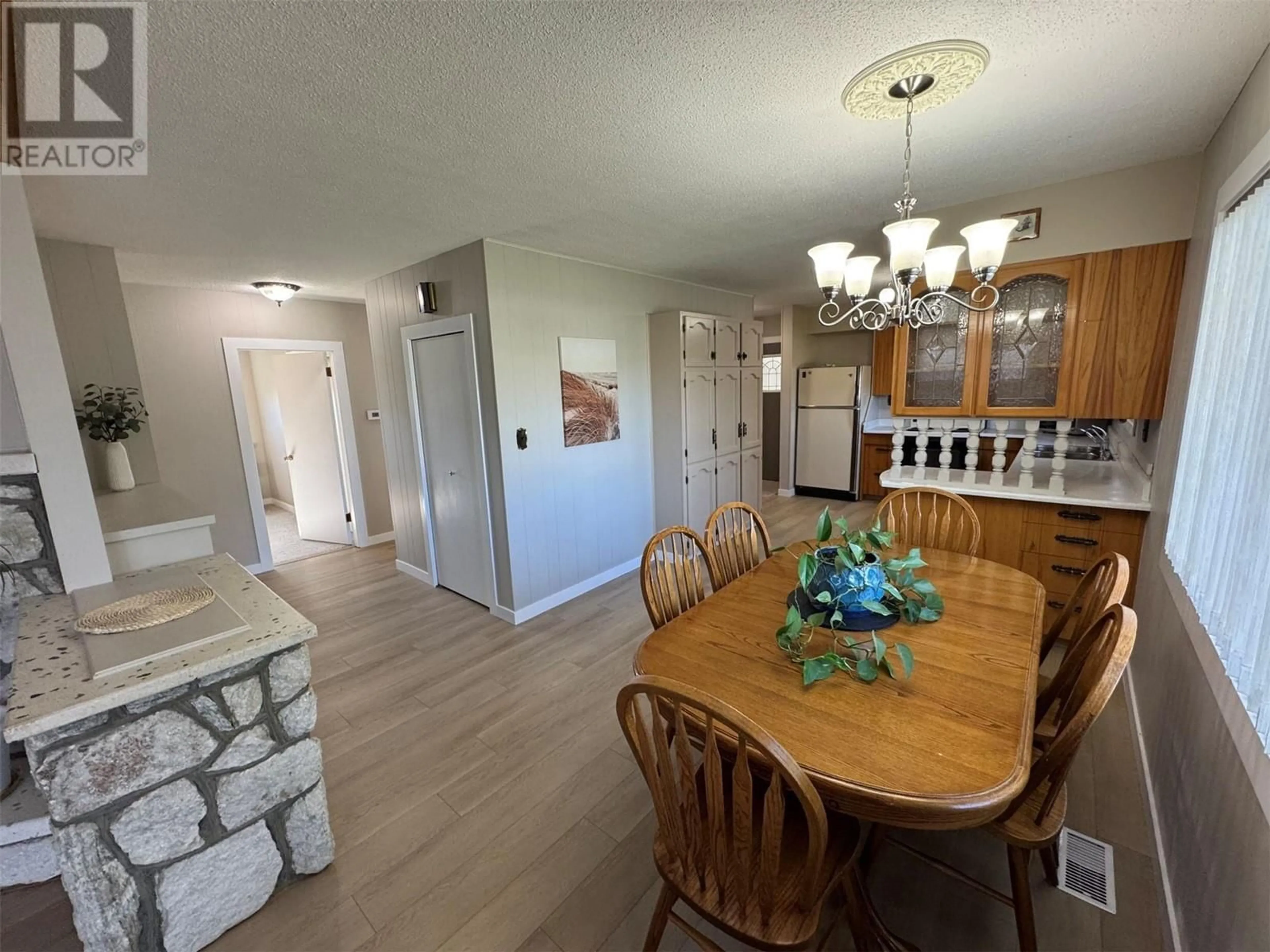 Dining room, wood/laminate floor for 7551 23RD STREET, Grand Forks British Columbia V0H1H2
