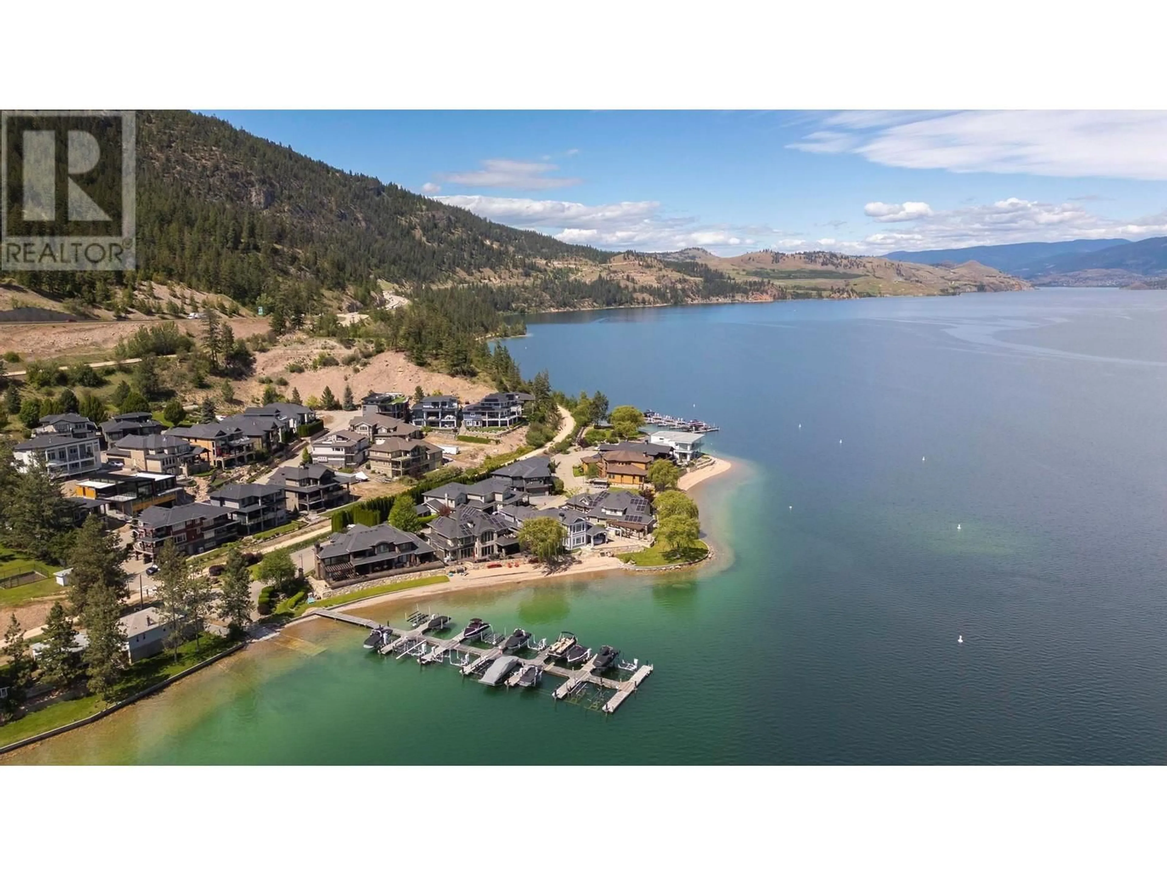 A pic from outside/outdoor area/front of a property/back of a property/a pic from drone, water/lake/river/ocean view for 32 - 18451 CRYSTAL WATERS ROAD, Lake Country British Columbia V4V2G2