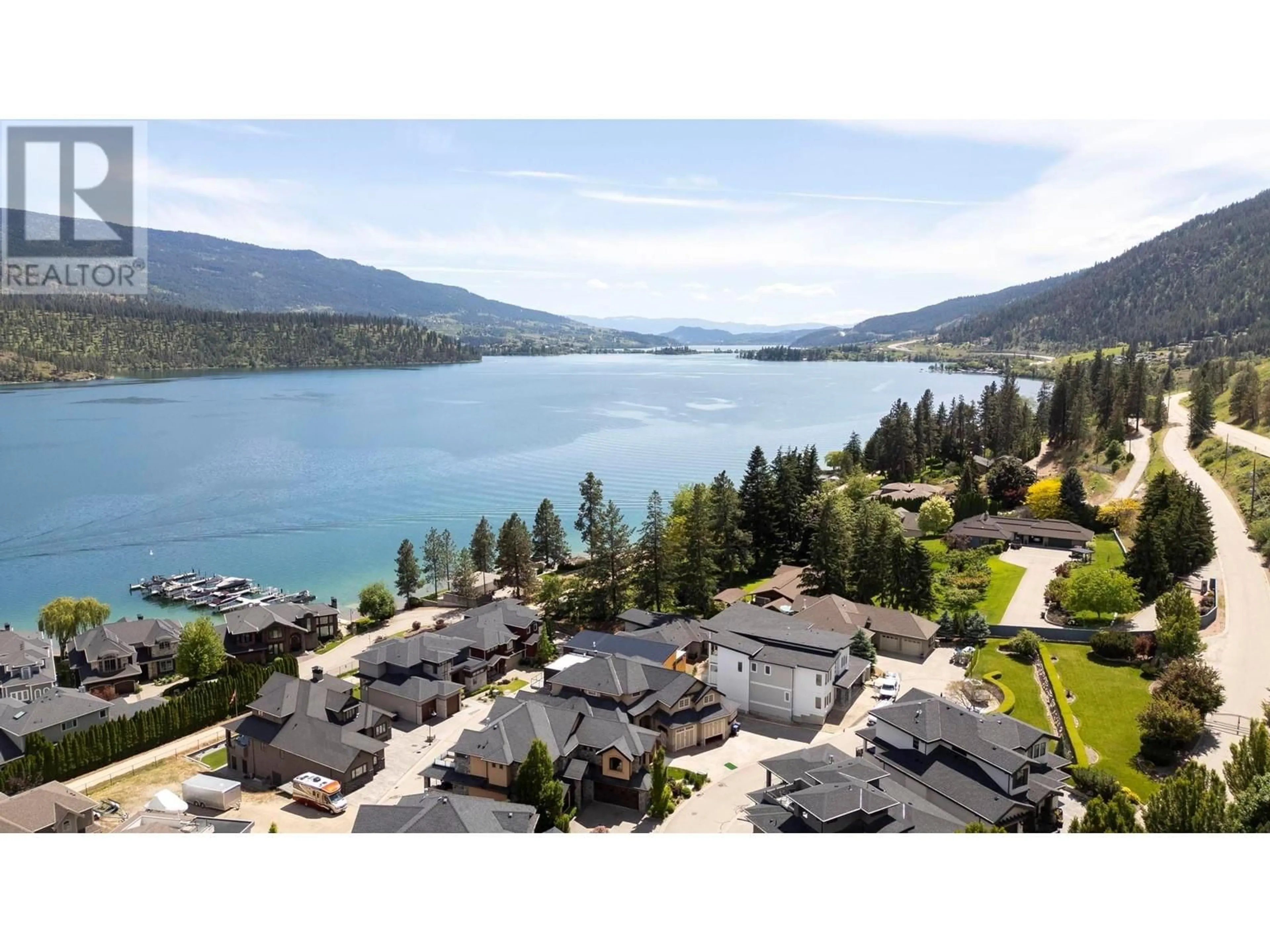 A pic from outside/outdoor area/front of a property/back of a property/a pic from drone, water/lake/river/ocean view for 32 - 18451 CRYSTAL WATERS ROAD, Lake Country British Columbia V4V2G2