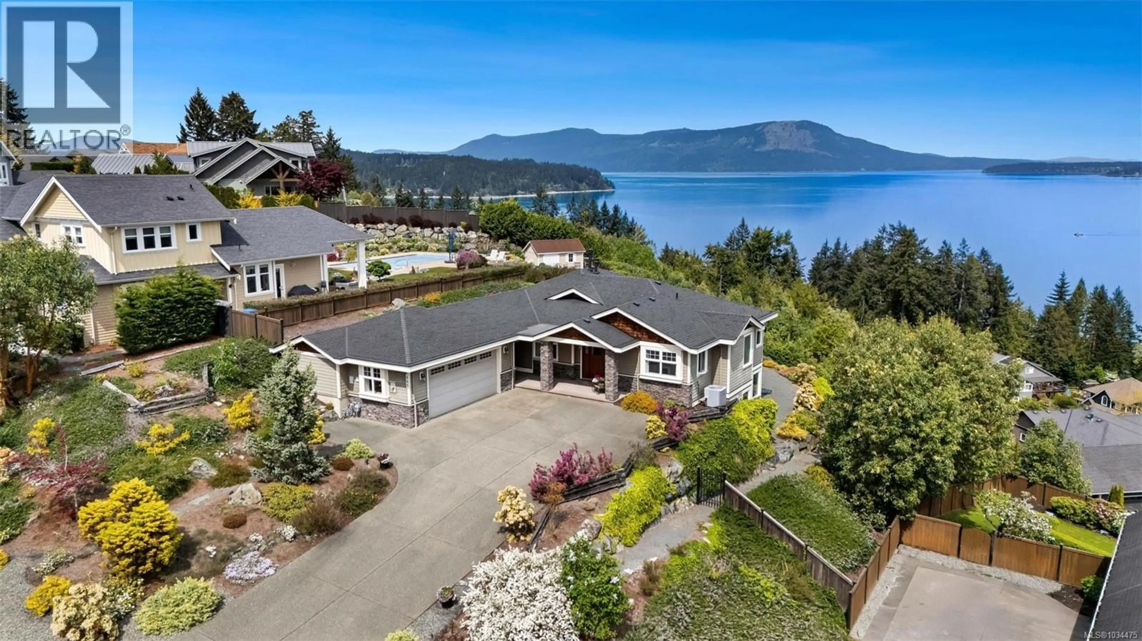 A pic from outside/outdoor area/front of a property/back of a property/a pic from drone, water/lake/river/ocean view for 553 SENTINEL DRIVE, Mill Bay British Columbia V8H1H7