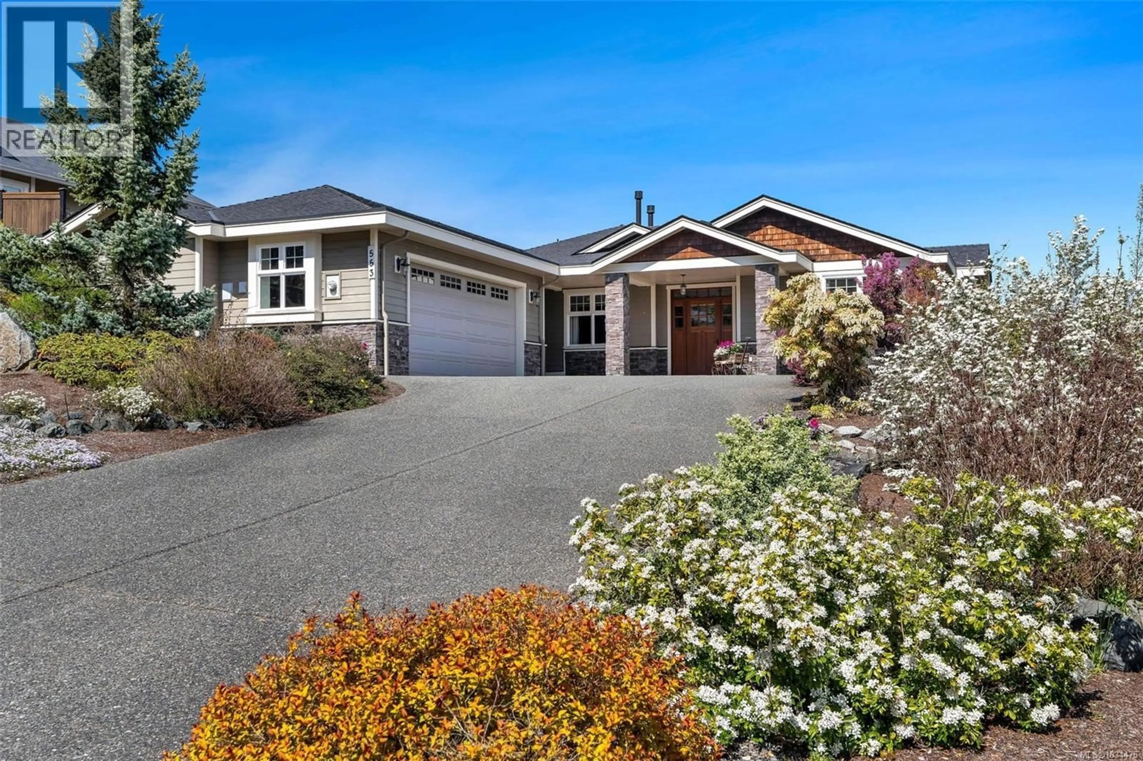 Home with vinyl exterior material, street for 553 SENTINEL DRIVE, Mill Bay British Columbia V8H1H7