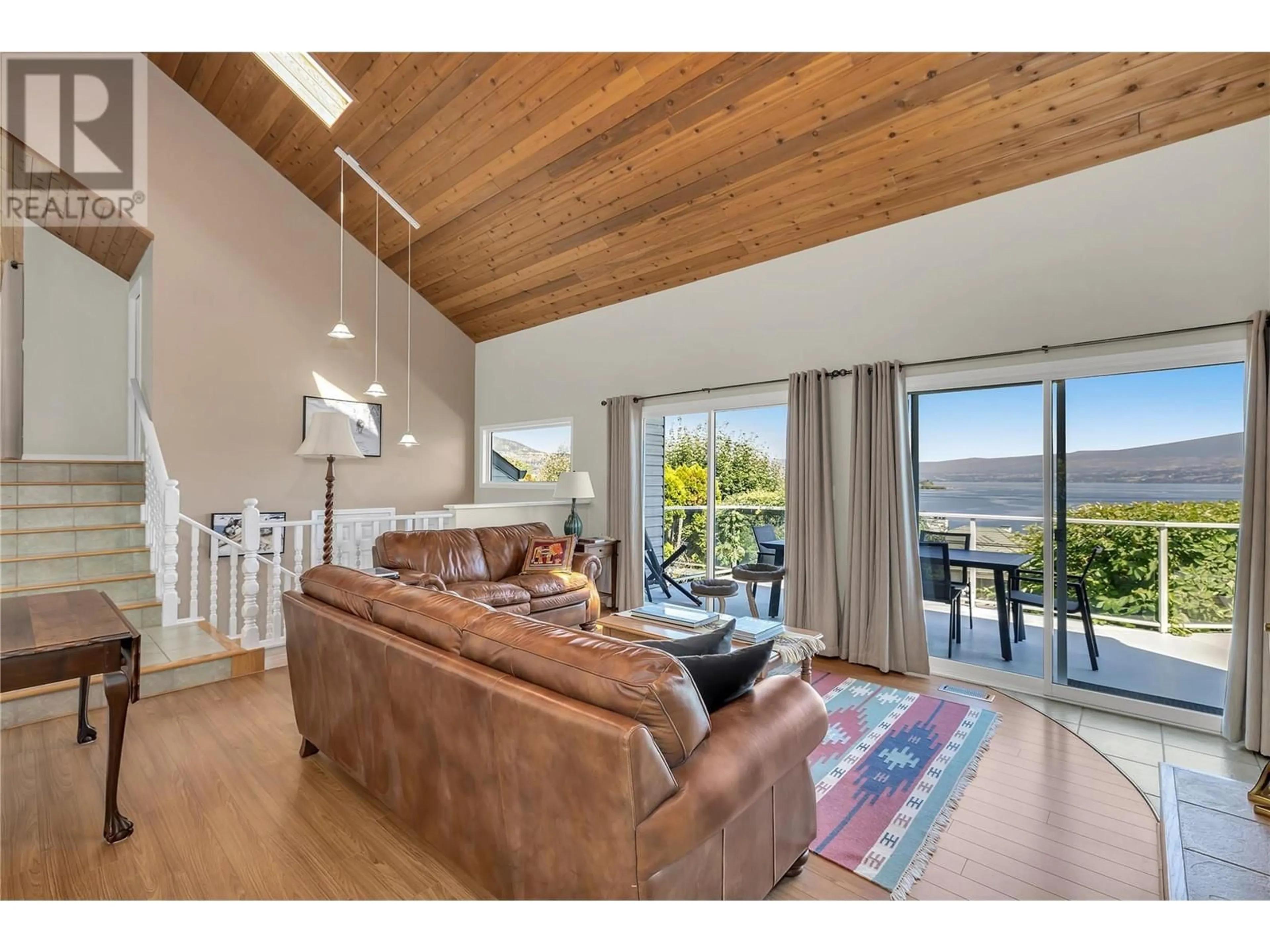 Living room with furniture, wood/laminate floor for 3964 ANGUS DRIVE, West Kelowna British Columbia V4T2K1