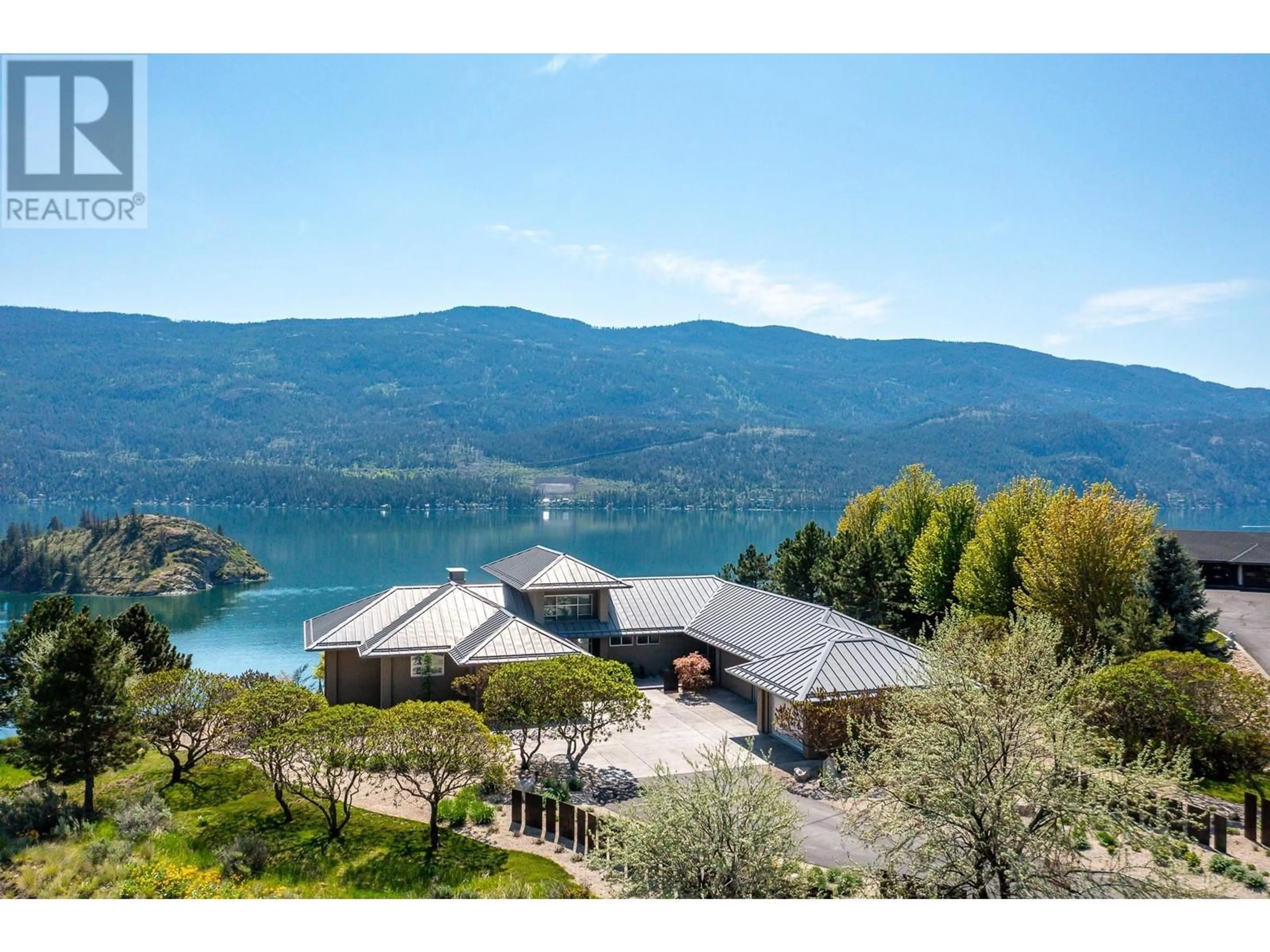 A pic from outside/outdoor area/front of a property/back of a property/a pic from drone, water/lake/river/ocean view for 13 - 245 KALAMALKA LAKEVIEW DRIVE, Vernon British Columbia V1H1R6