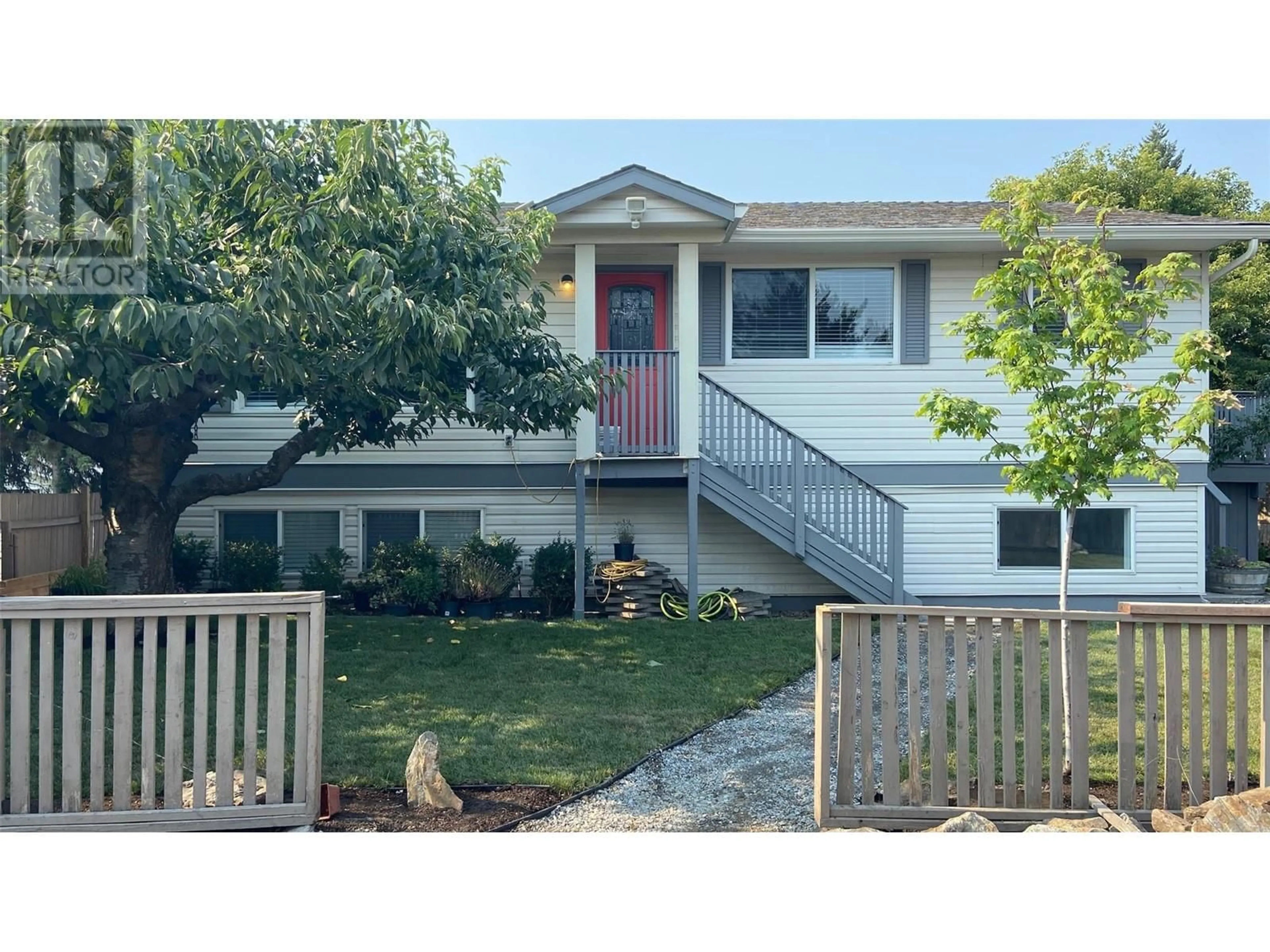 Home with vinyl exterior material, street for 2 - 1343 HIGHLAND DRIVE SOUTH, Kelowna British Columbia V1Y3V9