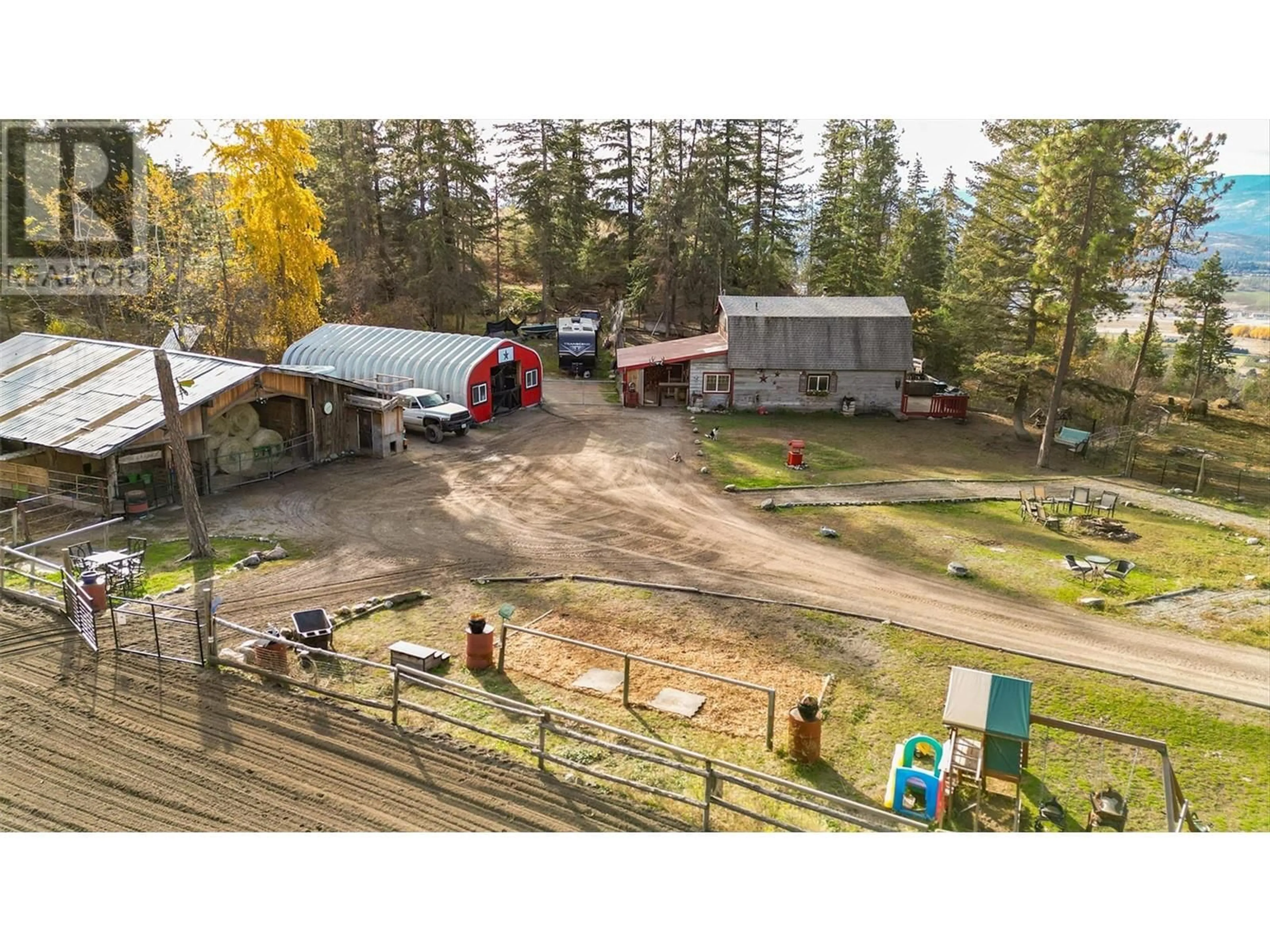 A pic from outside/outdoor area/front of a property/back of a property/a pic from drone, unknown for 5974 FARMERS DRIVE, Kelowna British Columbia V1P1A3