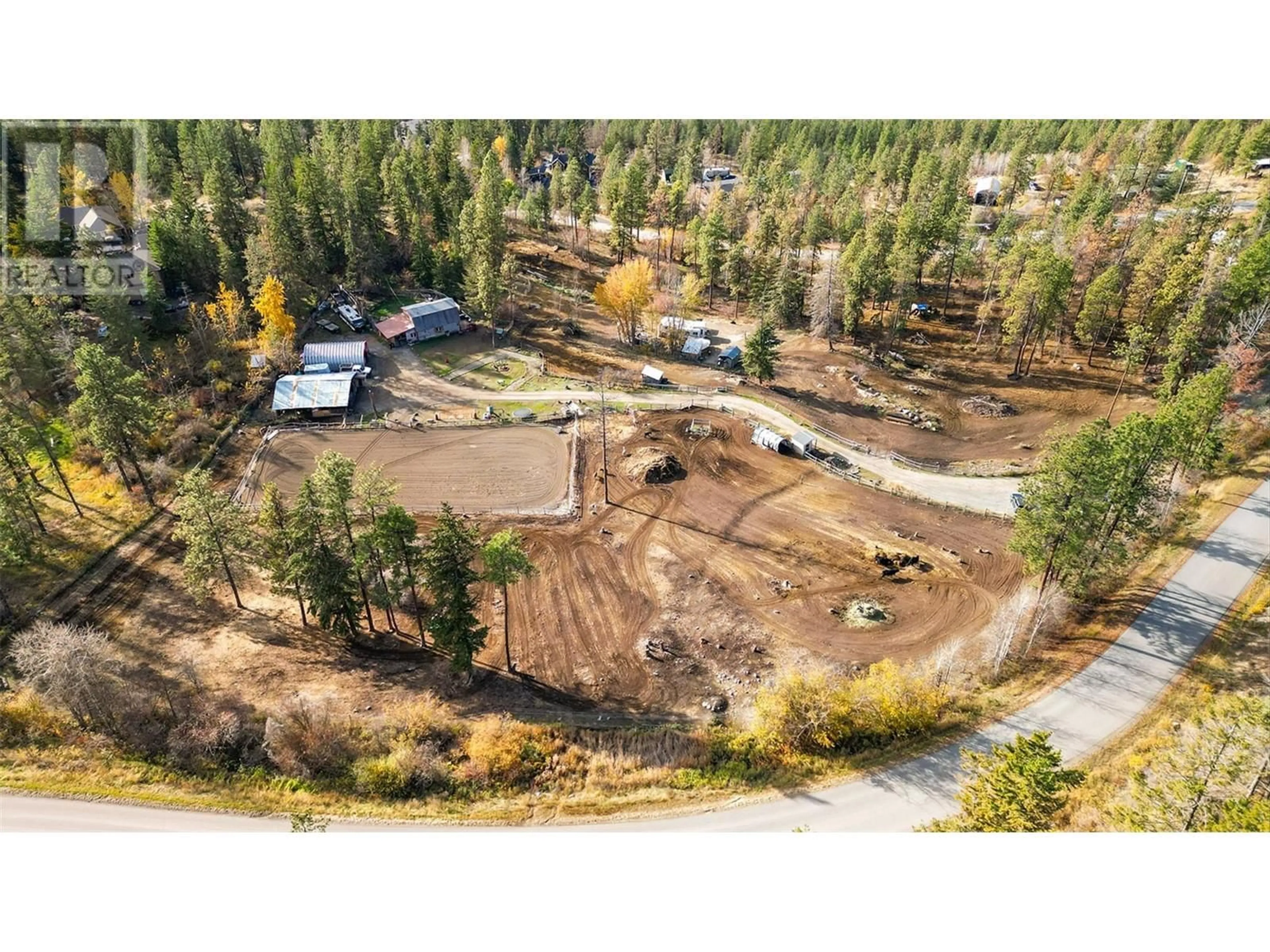 A pic from outside/outdoor area/front of a property/back of a property/a pic from drone, unknown for 5974 FARMERS DRIVE, Kelowna British Columbia V1P1A3