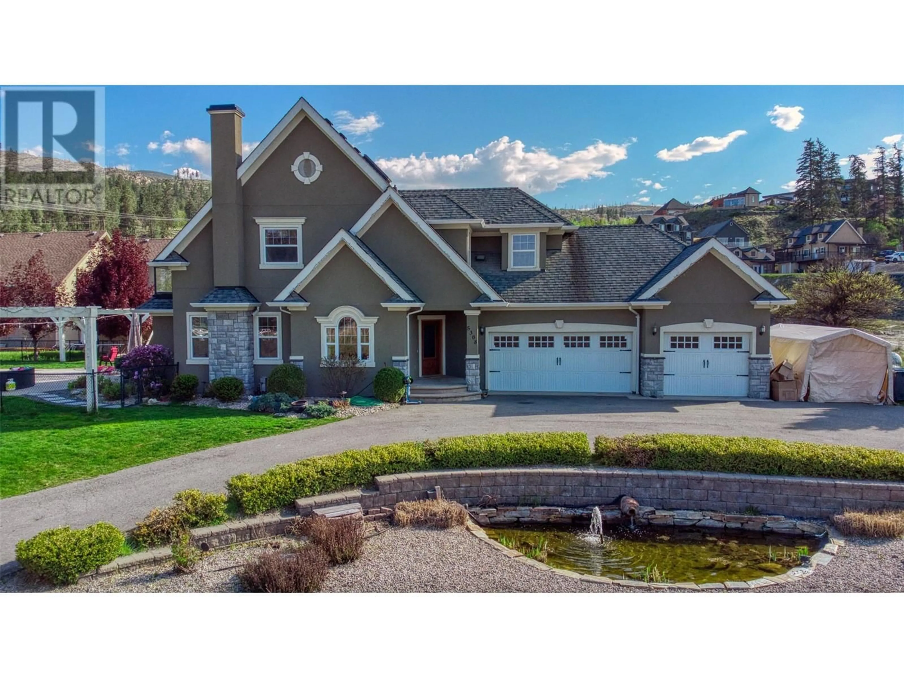 Home with vinyl exterior material, street for 5308 UPPER MISSION DRIVE, Kelowna British Columbia V1W3S9
