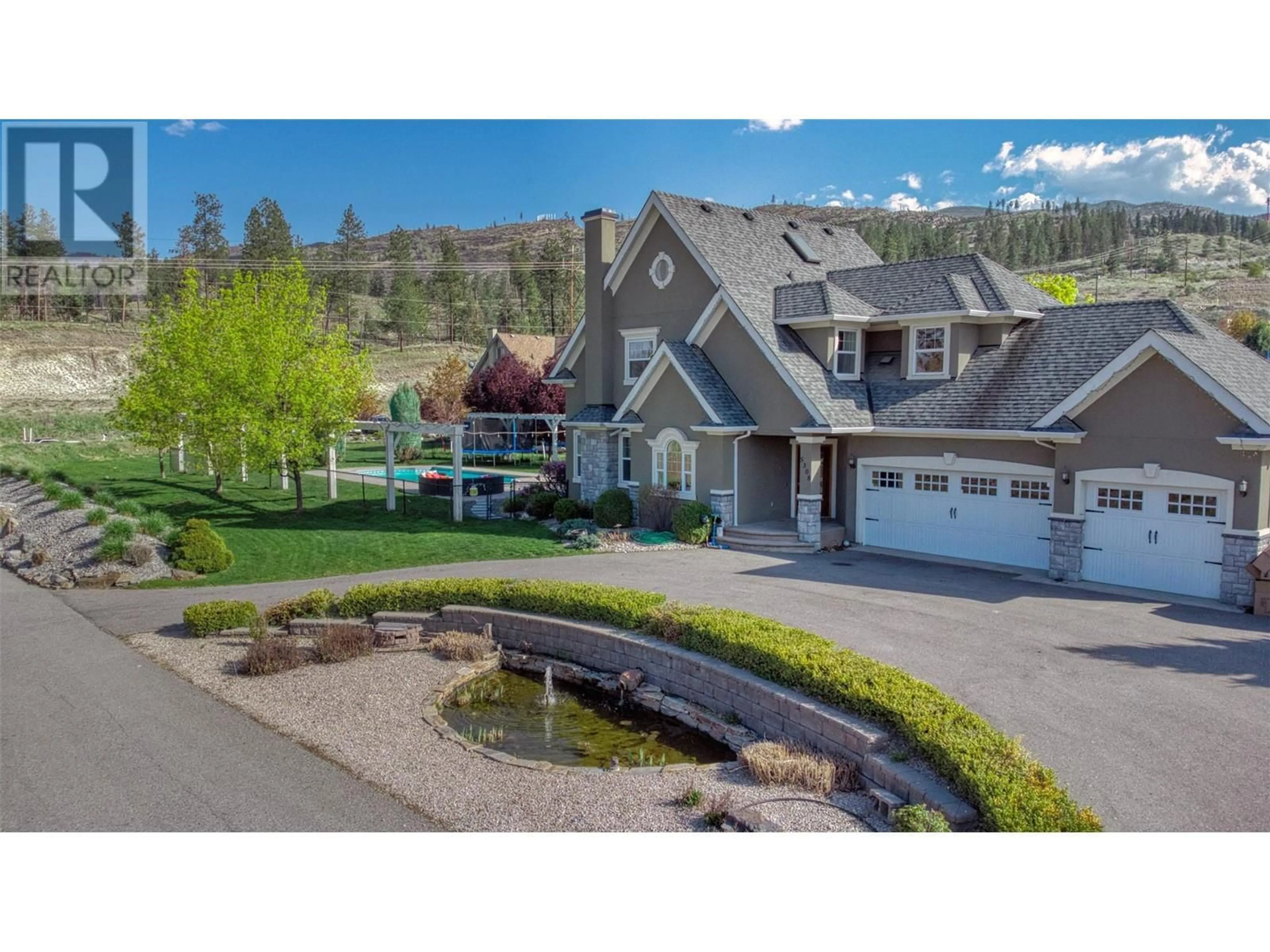 A pic from outside/outdoor area/front of a property/back of a property/a pic from drone, mountain view for 5308 UPPER MISSION DRIVE, Kelowna British Columbia V1W3S9
