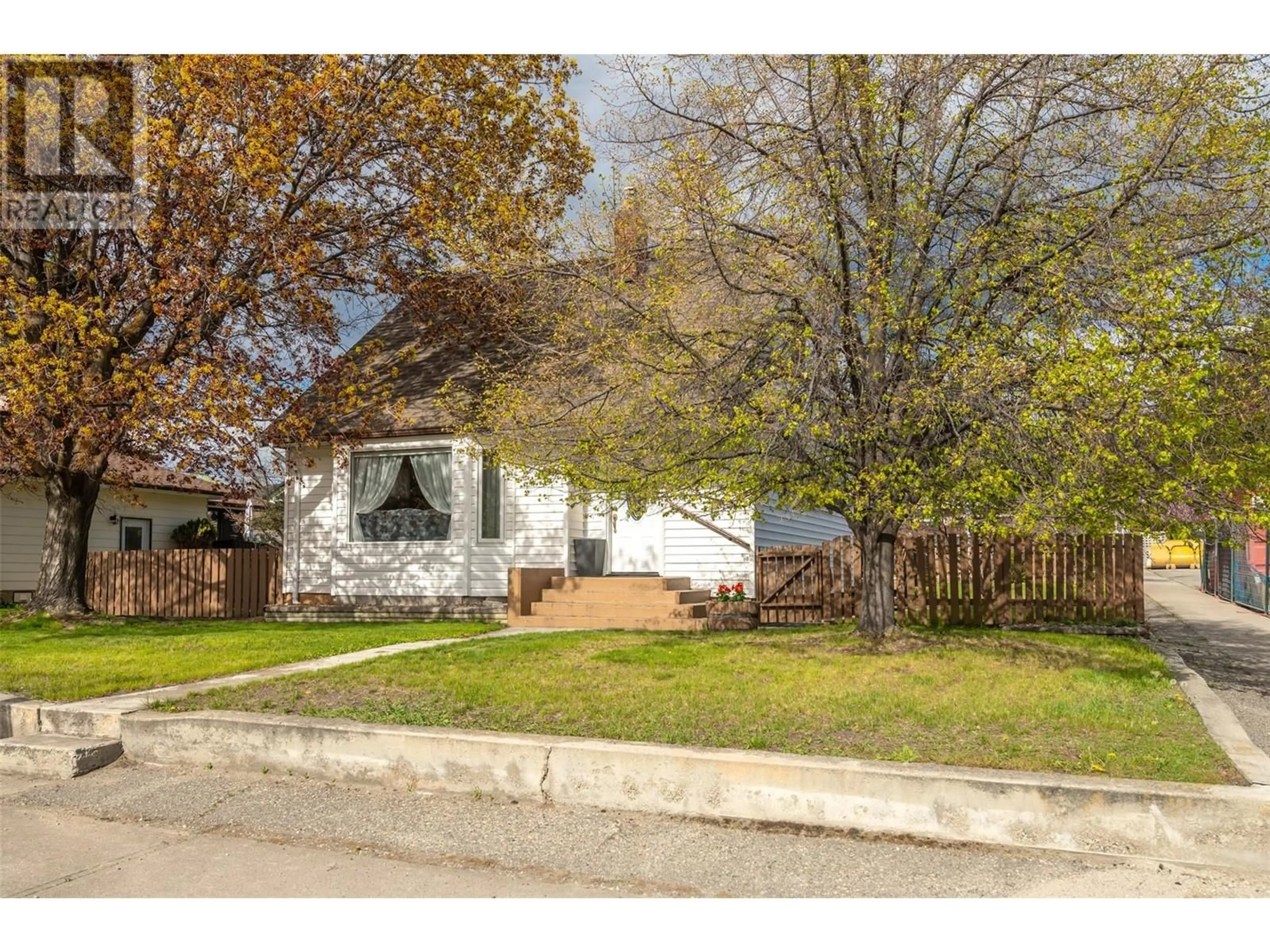 A pic from outside/outdoor area/front of a property/back of a property/a pic from drone, street for 1298 KENSINGTON STREET, Penticton British Columbia V2A4N4