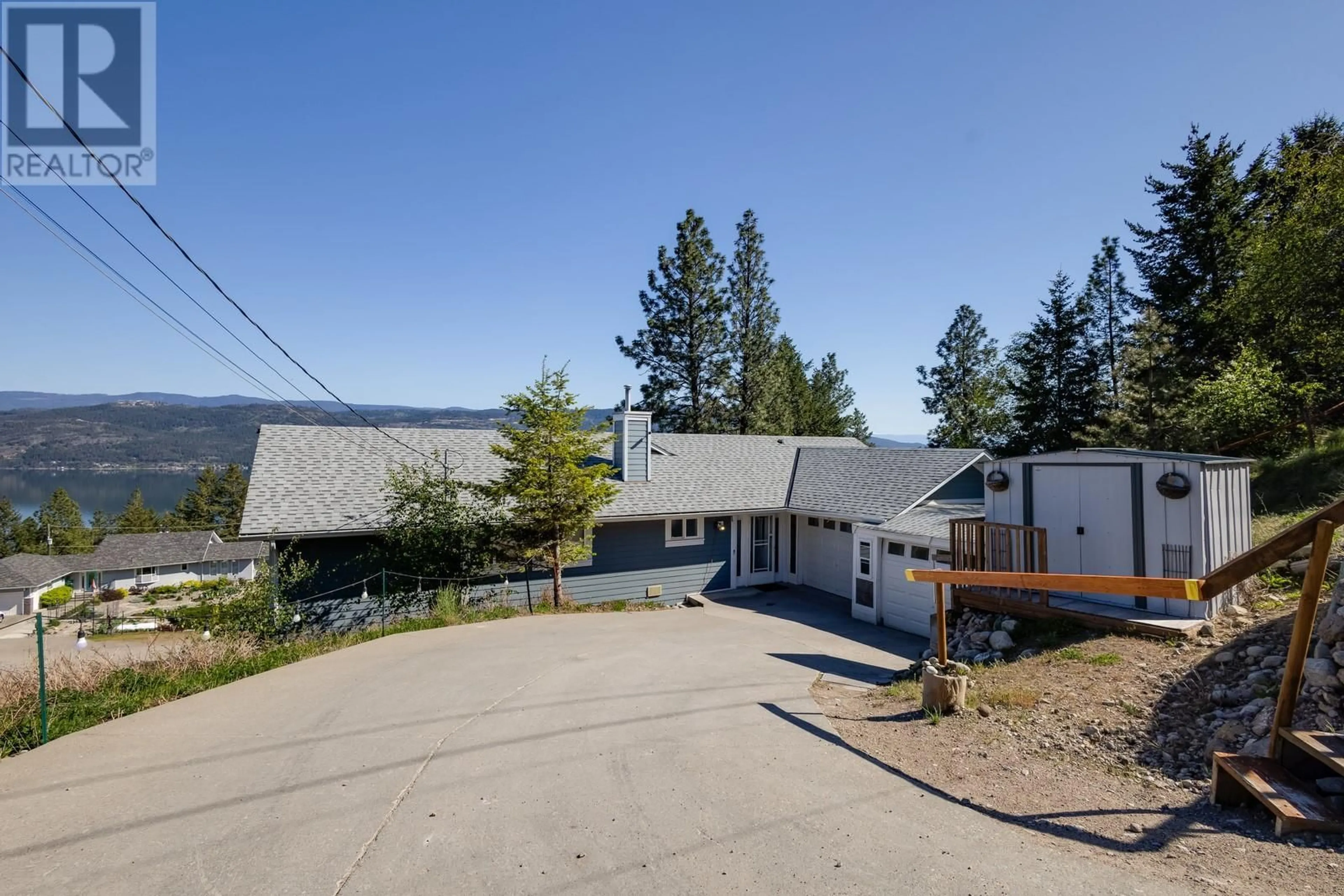 A pic from outside/outdoor area/front of a property/back of a property/a pic from drone, mountain view for 10434 COLUMBIA WAY, Vernon British Columbia V1H2B5