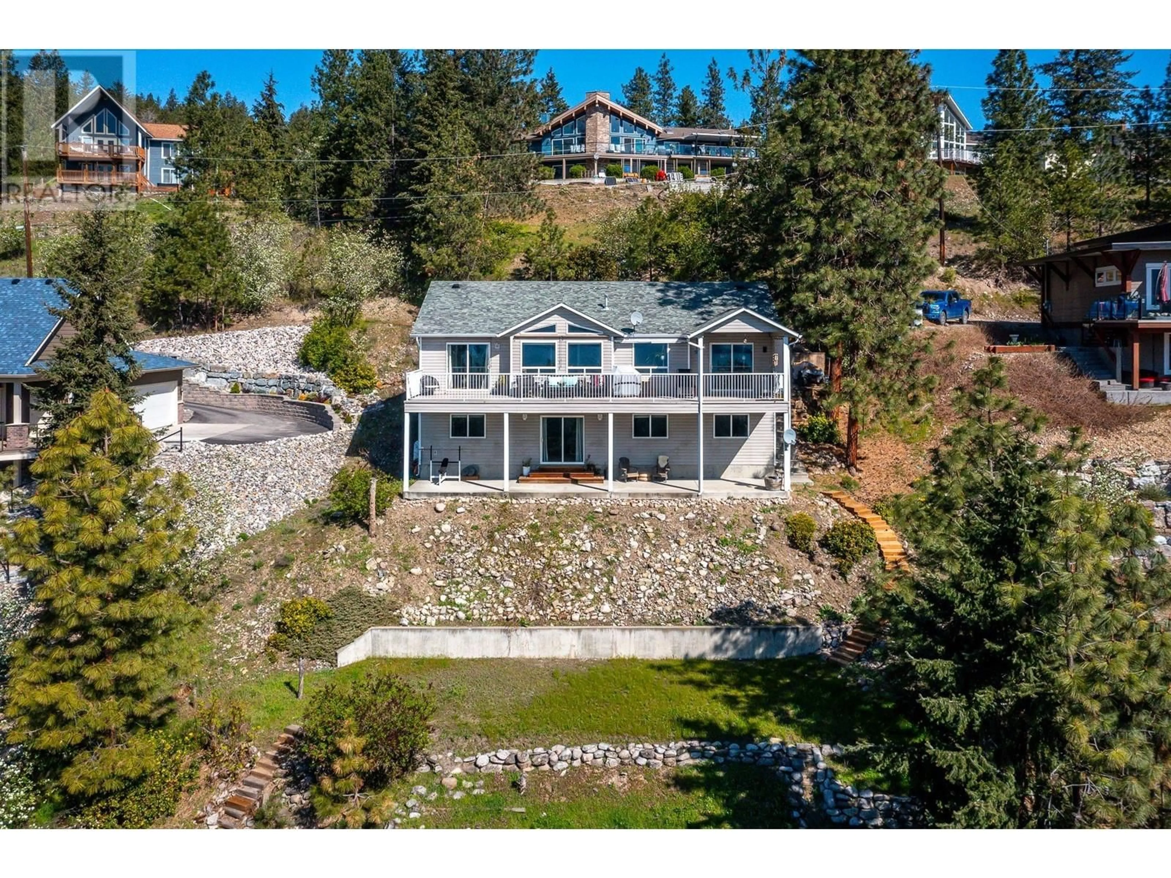 A pic from outside/outdoor area/front of a property/back of a property/a pic from drone, water/lake/river/ocean view for 10778 PINECREST ROAD, Vernon British Columbia V1H2C1