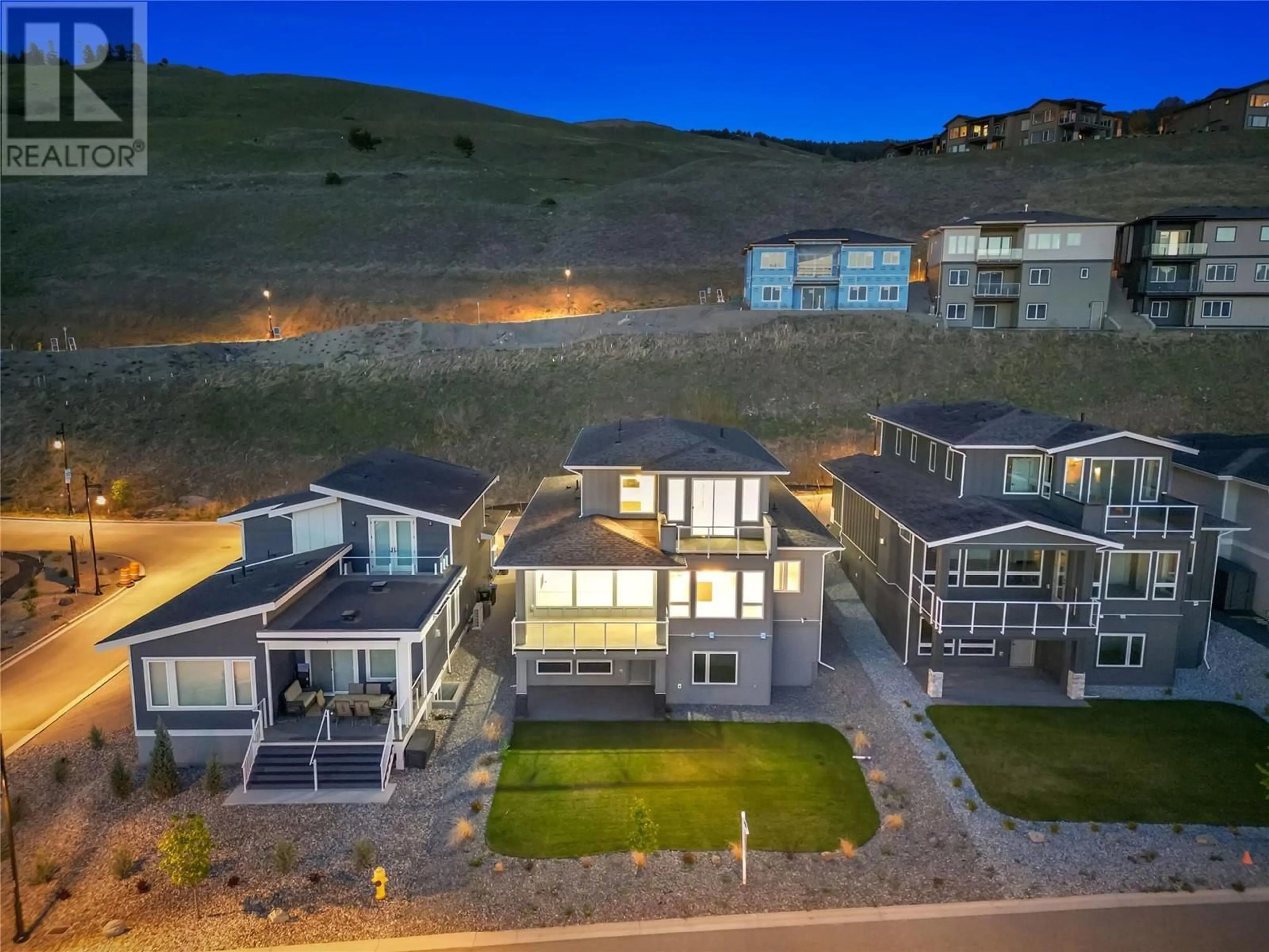 A pic from outside/outdoor area/front of a property/back of a property/a pic from drone, mountain view for 2157 KENTUCKY CRESCENT, Kelowna British Columbia V1P1S8