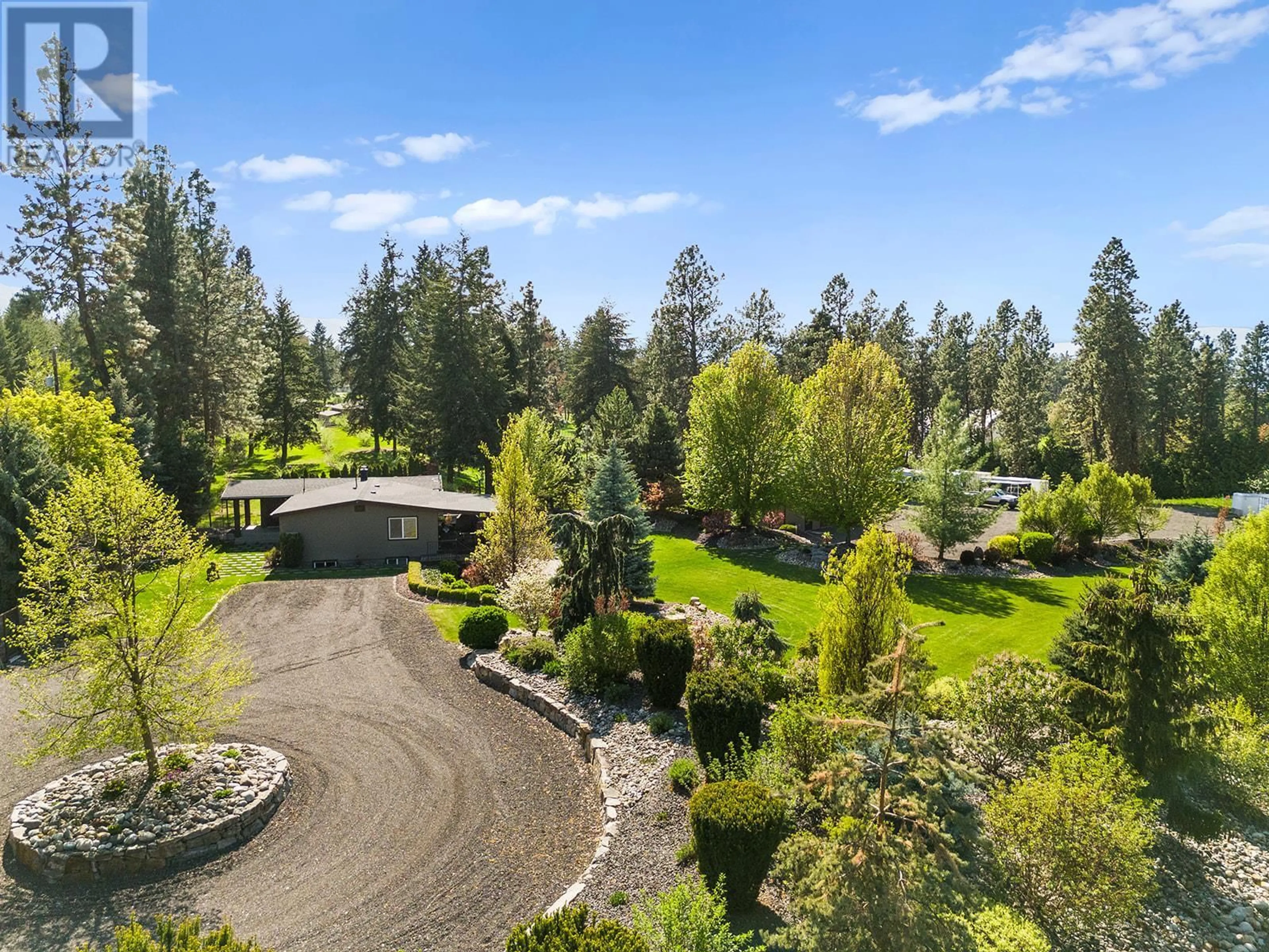 A pic from outside/outdoor area/front of a property/back of a property/a pic from drone, unknown for 4190 MCCLAIN ROAD, Kelowna British Columbia V1W4E1