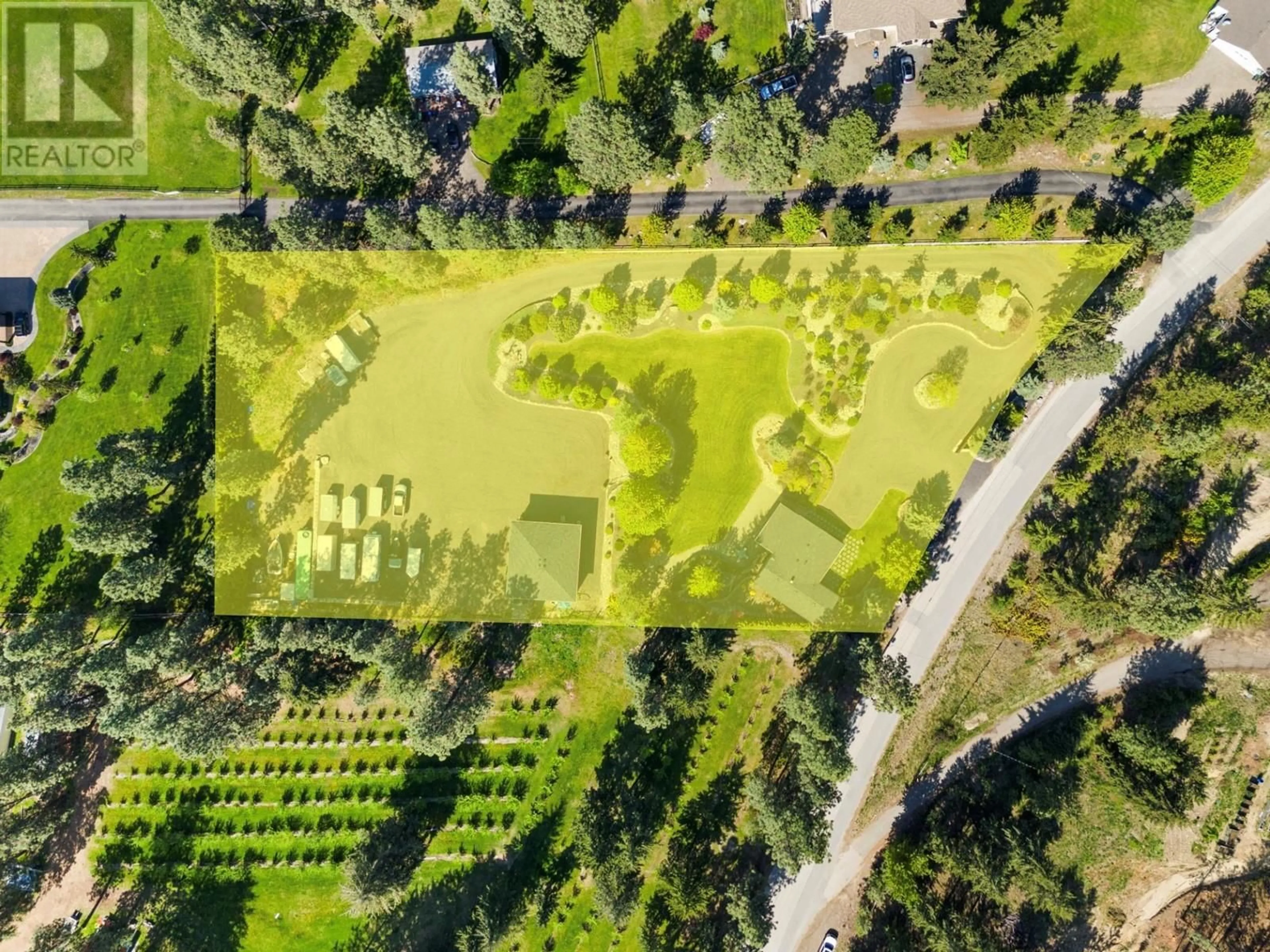 A pic from outside/outdoor area/front of a property/back of a property/a pic from drone, forest/trees view for 4190 MCCLAIN ROAD, Kelowna British Columbia V1W4E1