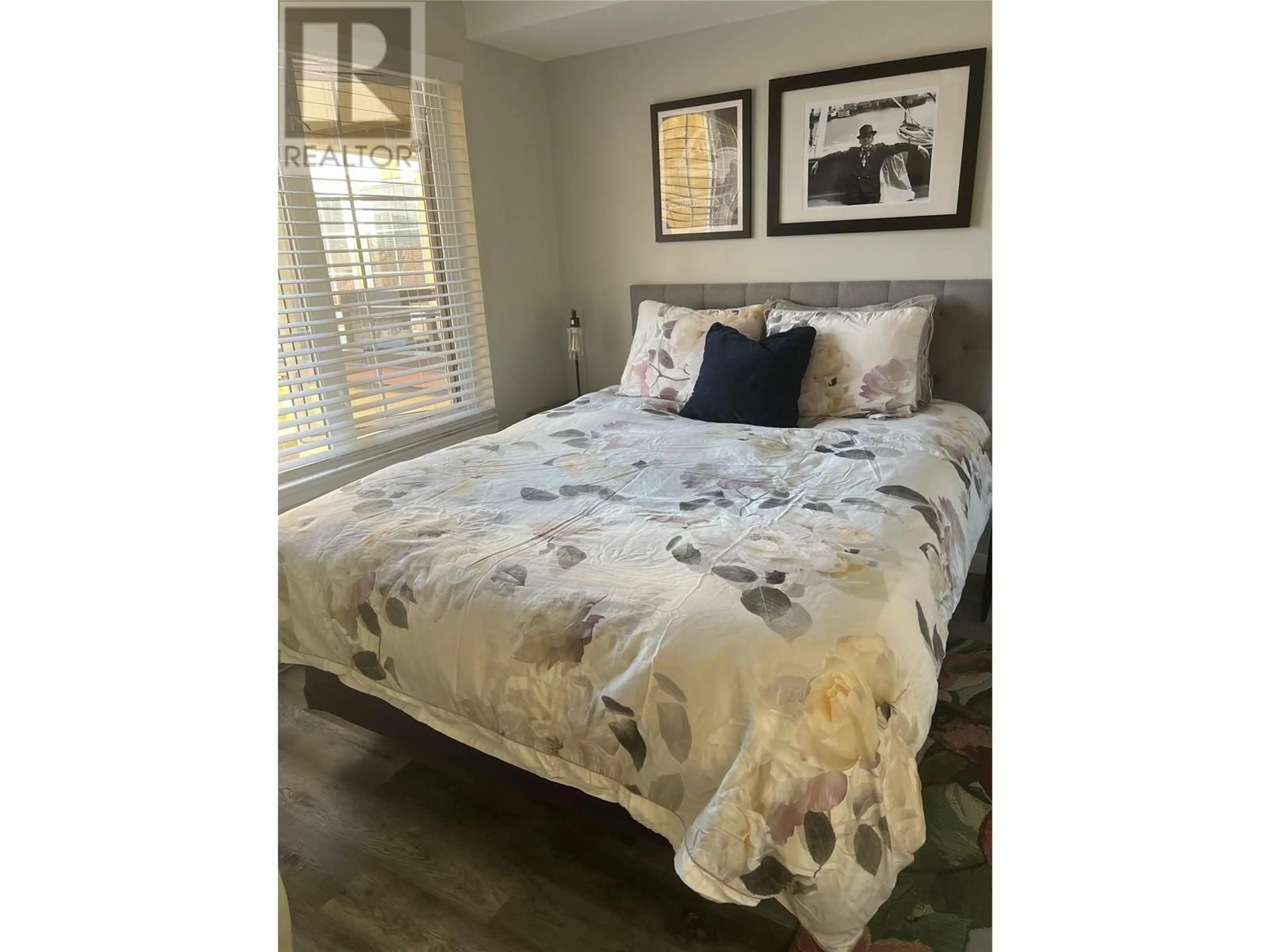 Bedroom with bed, wood/laminate floor for 315 - 7600 COTTONWOOD DRIVE, Osoyoos British Columbia V0H1V3