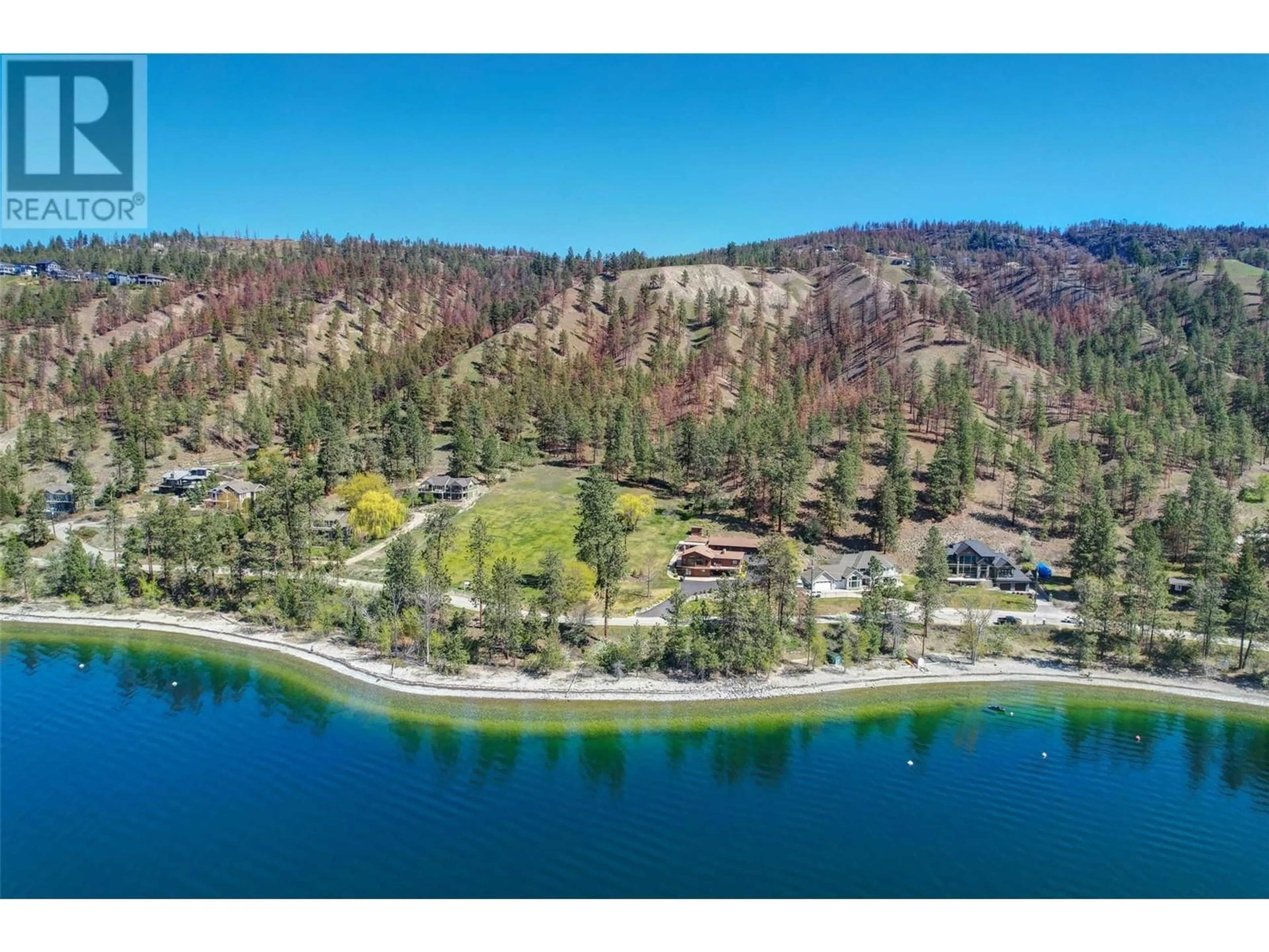 A pic from outside/outdoor area/front of a property/back of a property/a pic from drone, water/lake/river/ocean view for 9983 OKANAGAN CENTRE ROAD WEST, Lake Country British Columbia V4V2J3