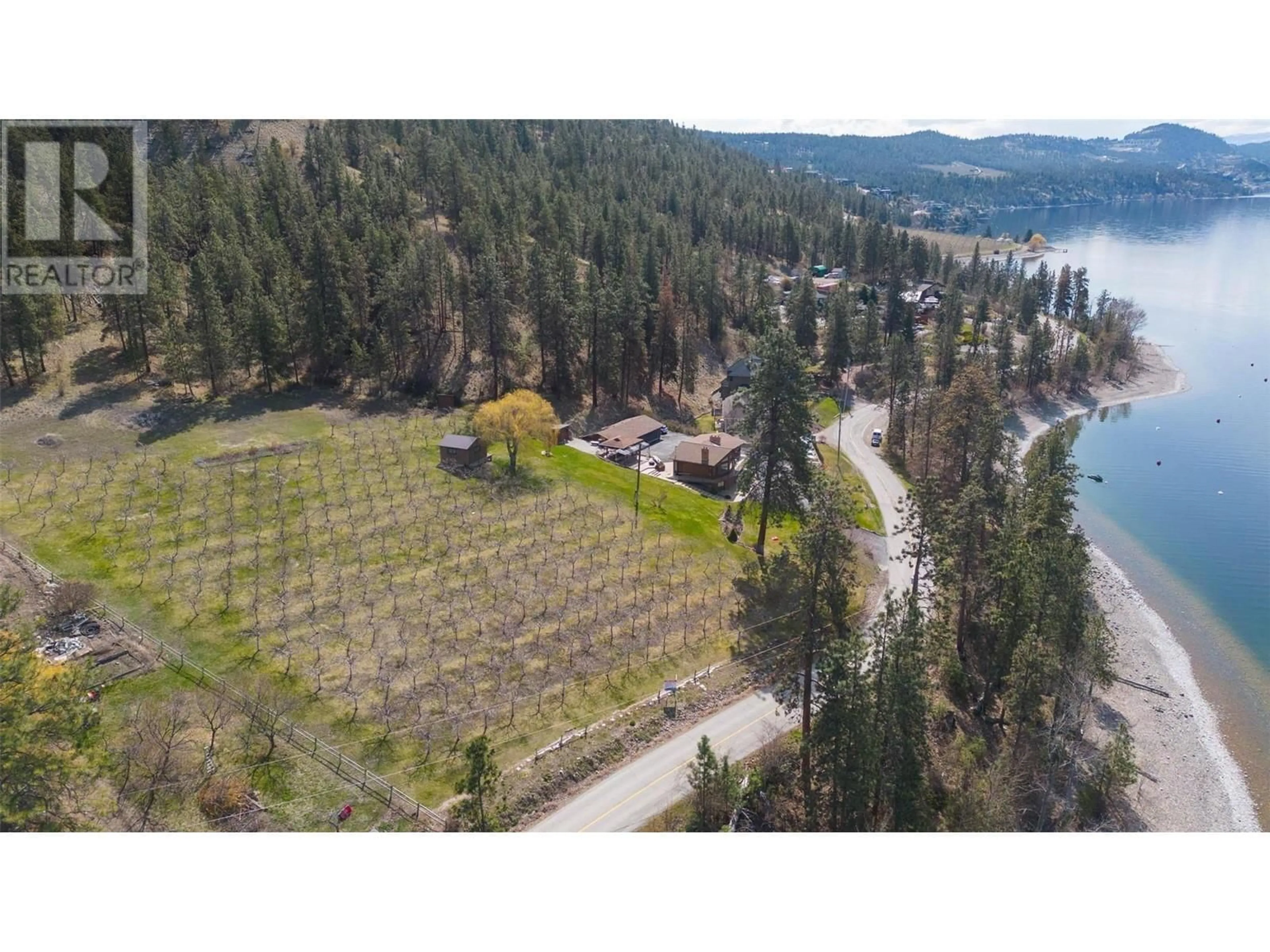 A pic from outside/outdoor area/front of a property/back of a property/a pic from drone, water/lake/river/ocean view for 9983 OKANAGAN CENTRE ROAD WEST, Lake Country British Columbia V4V2J3