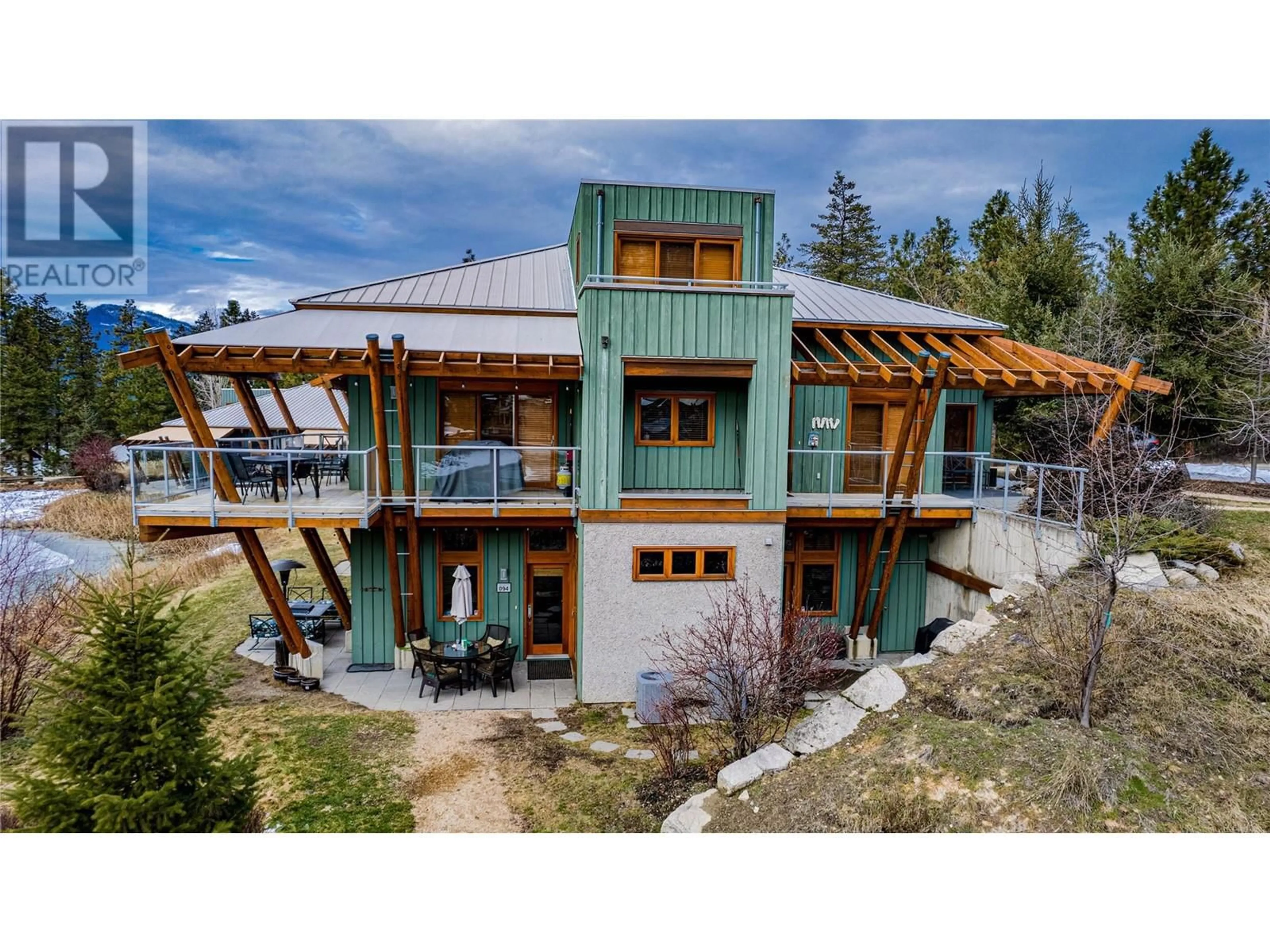 A pic from outside/outdoor area/front of a property/back of a property/a pic from drone, building for 94 - 9845 EASTSIDE ROAD, Vernon British Columbia V1H1Z2