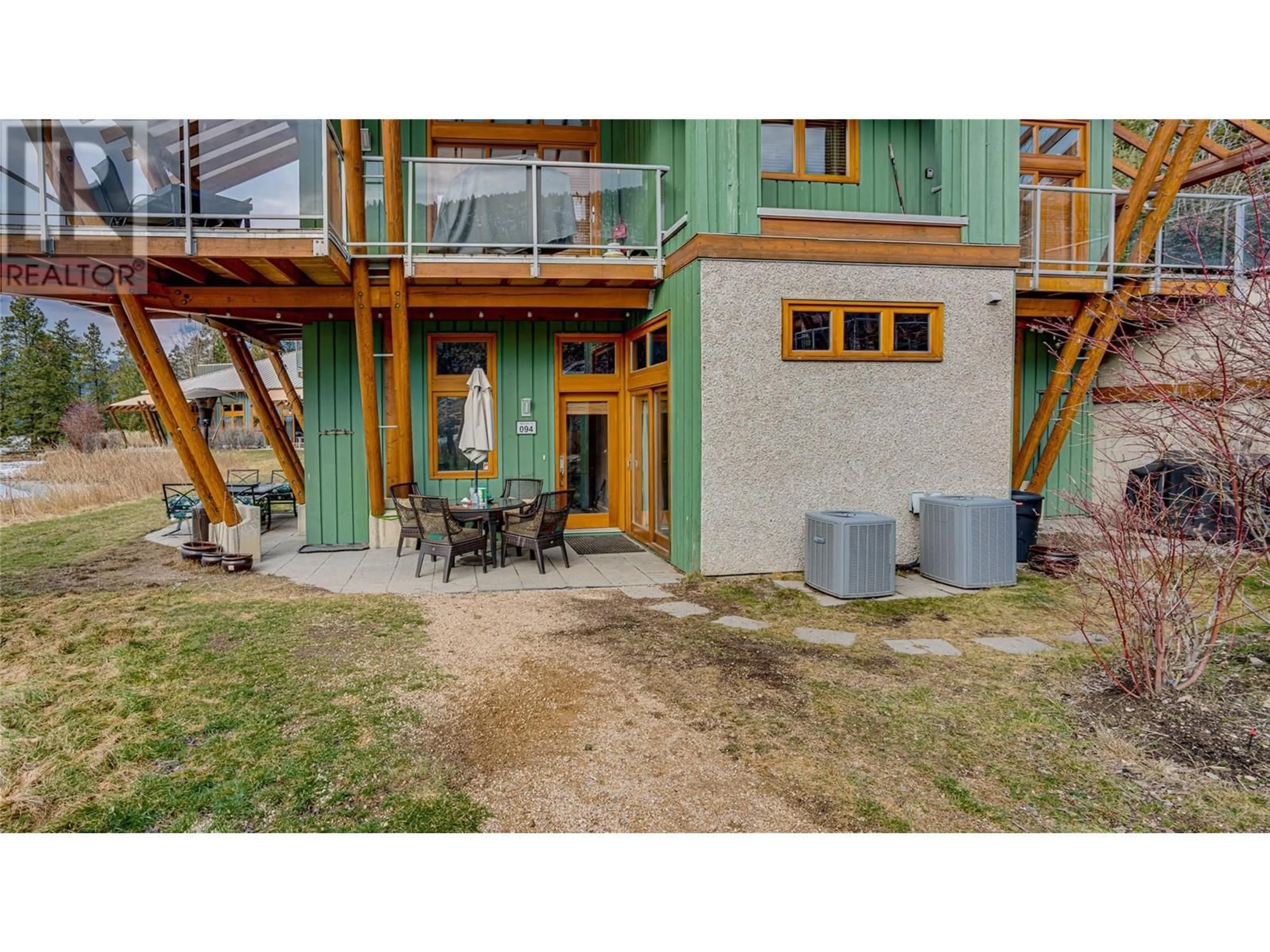 A pic from outside/outdoor area/front of a property/back of a property/a pic from drone, unknown for 94 - 9845 EASTSIDE ROAD, Vernon British Columbia V1H1Z2