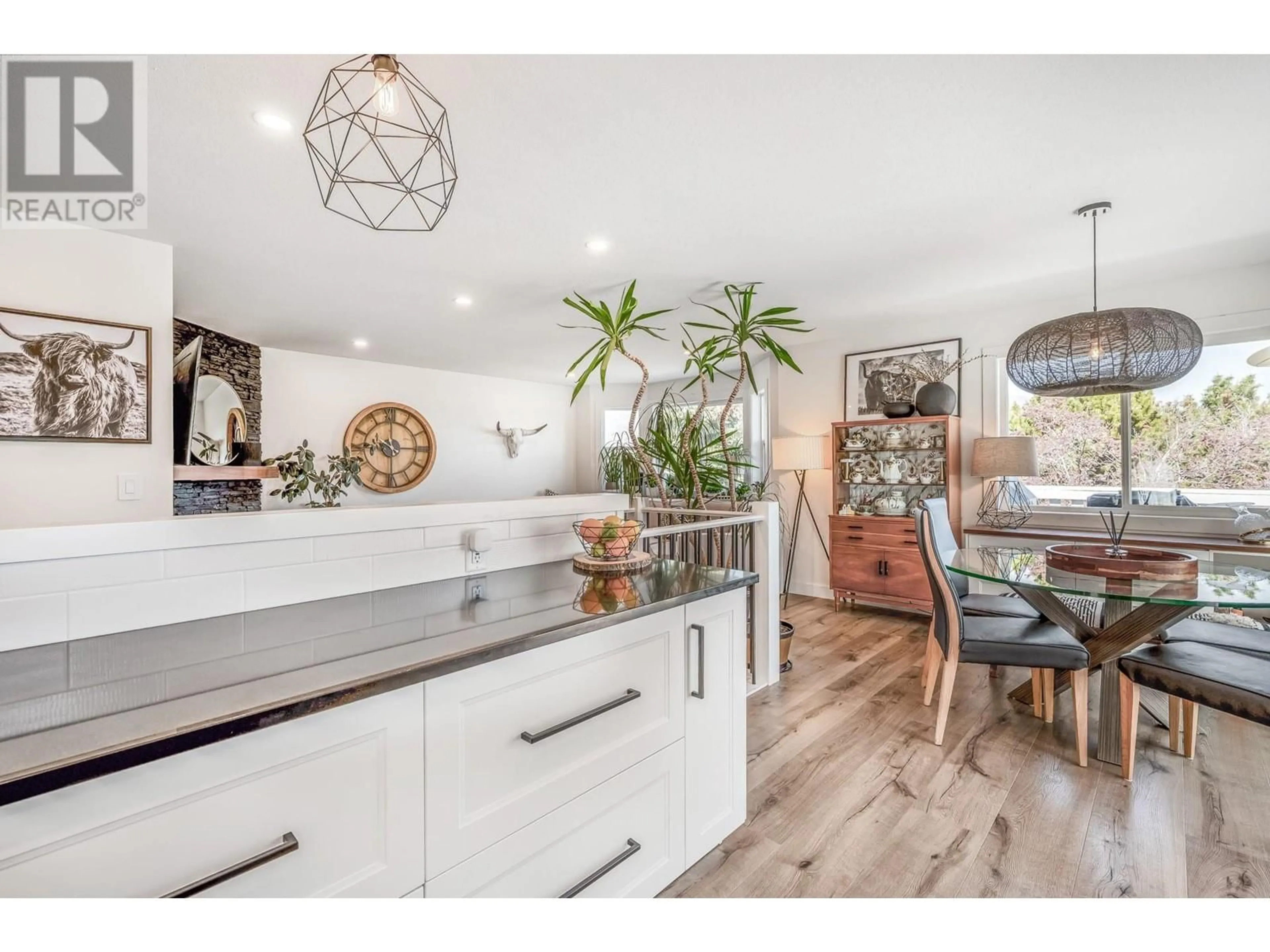 Open concept kitchen, wood/laminate floor for 1141 LYNDEN ROAD, West Kelowna British Columbia V1Z3L7