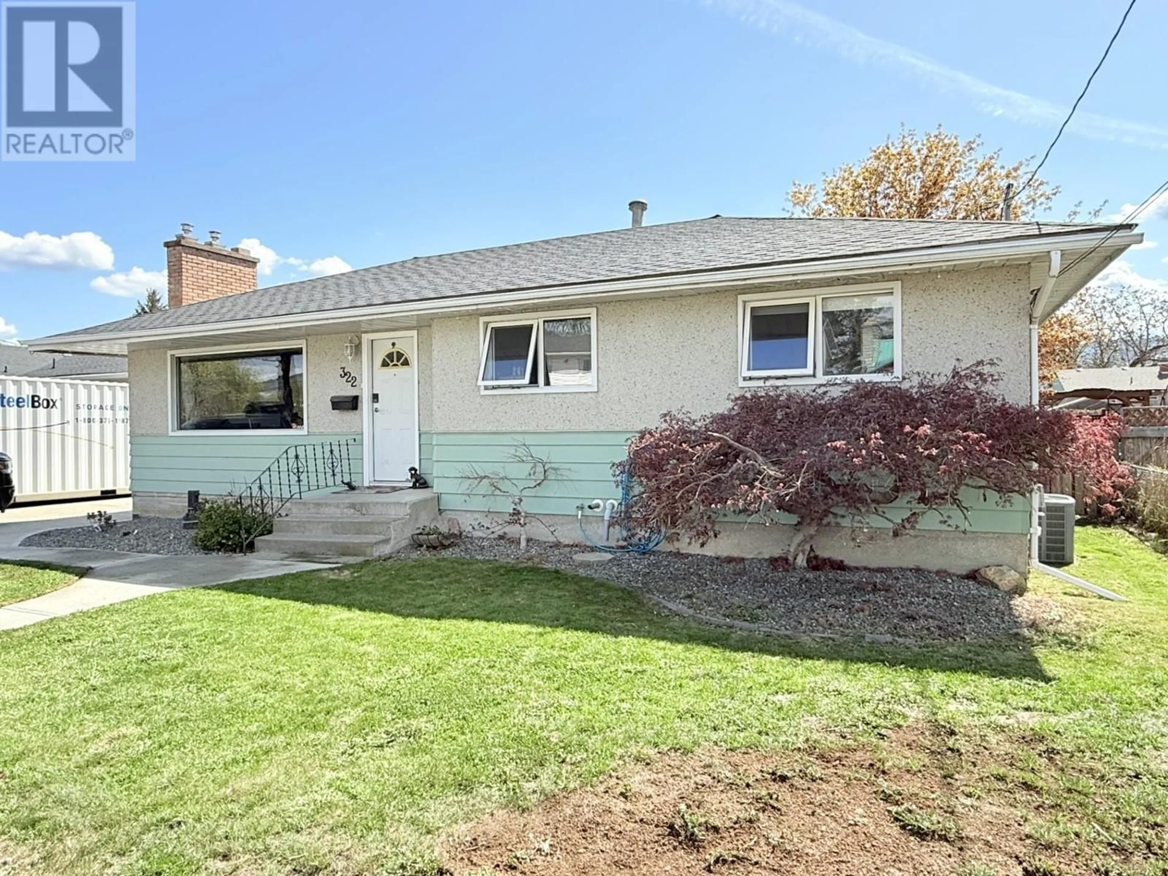 Home with vinyl exterior material, street for 322 WALNUT AVENUE, Kamloops British Columbia V2B1K3