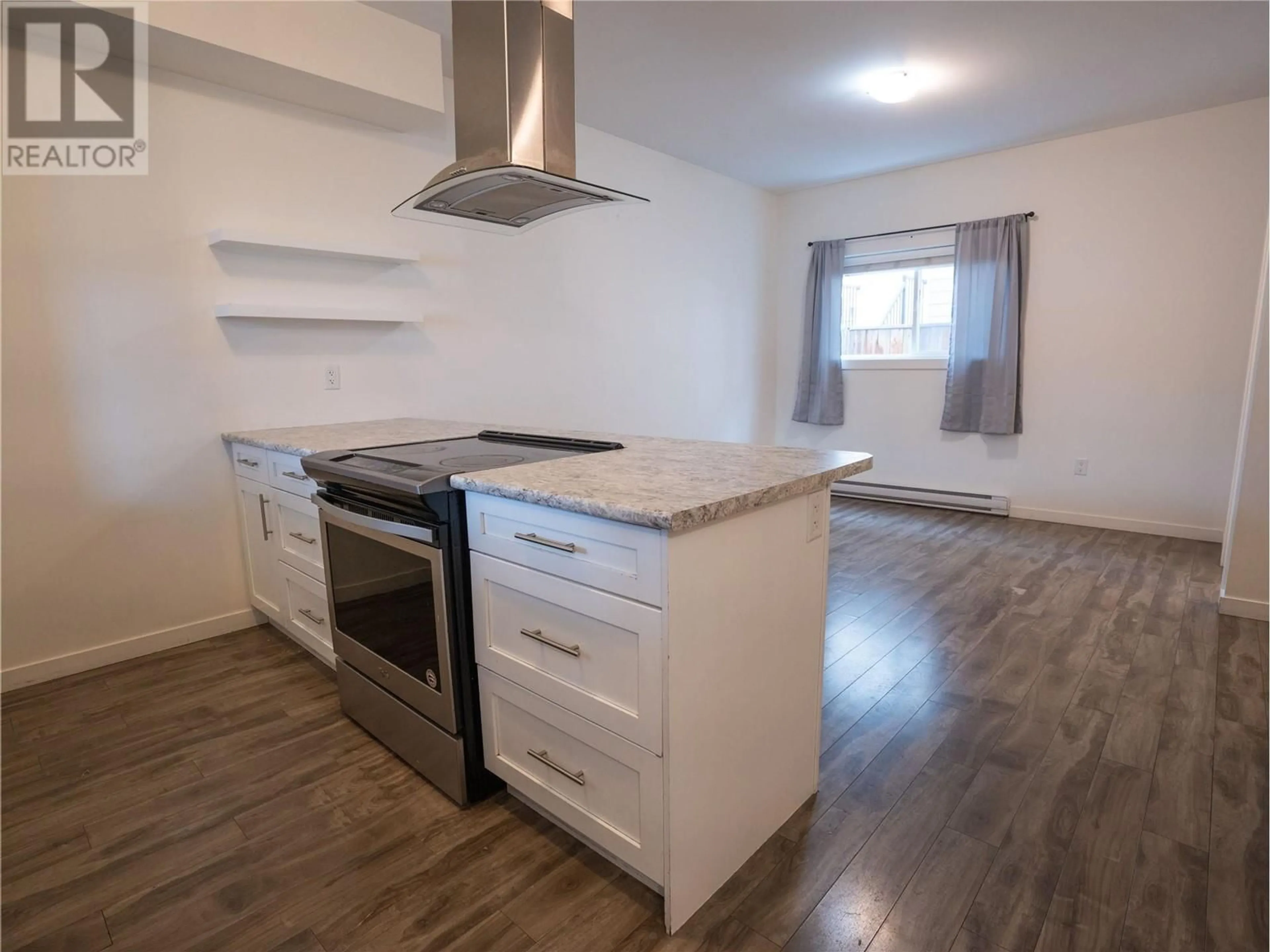 Standard kitchen, wood/laminate floor for 104 - 601 ELLIS STREET, Penticton British Columbia V2A4M5