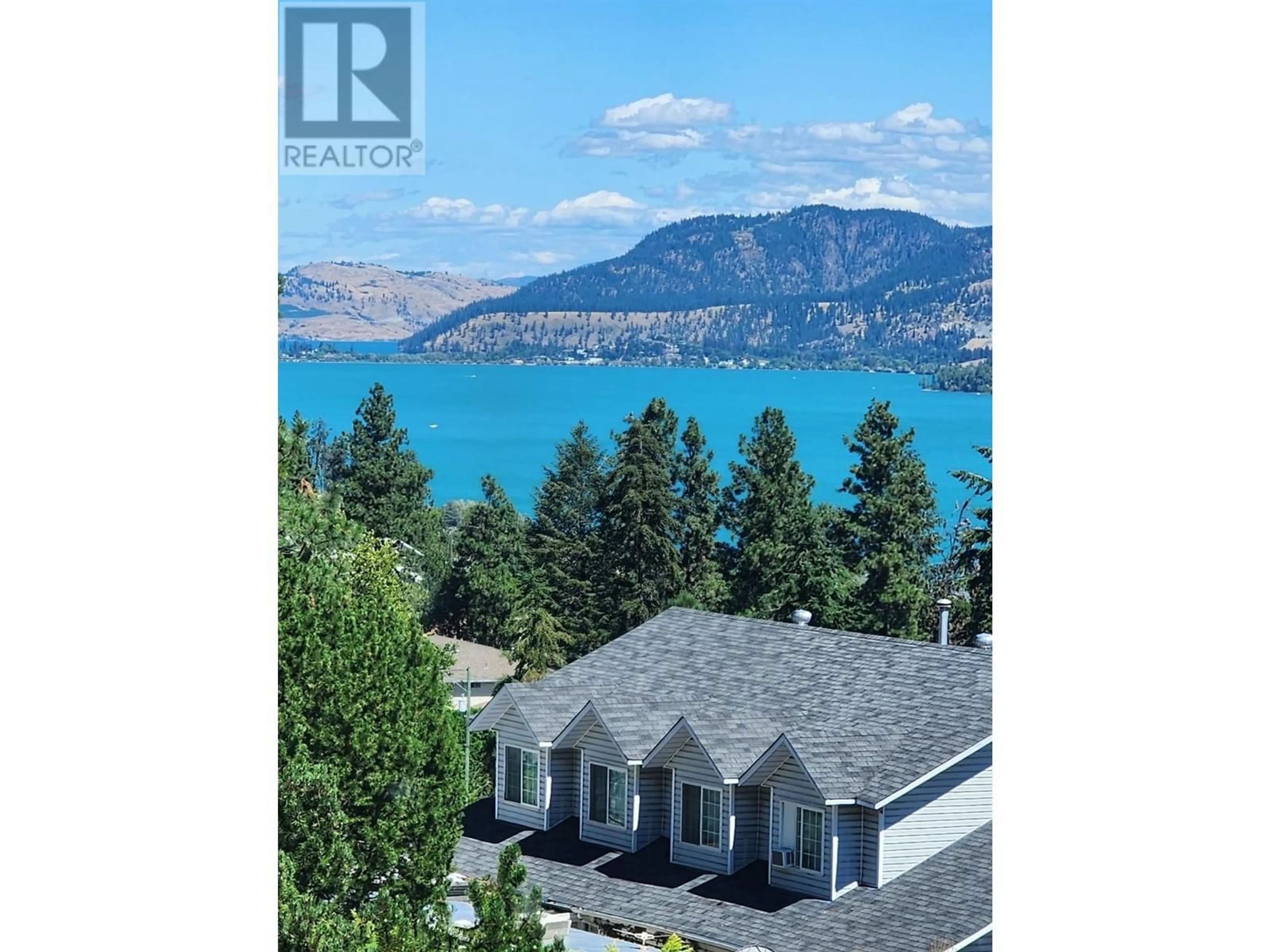 A pic from outside/outdoor area/front of a property/back of a property/a pic from drone, water/lake/river/ocean view for 11226 MIMAC ROAD, Lake Country British Columbia V4V1H7