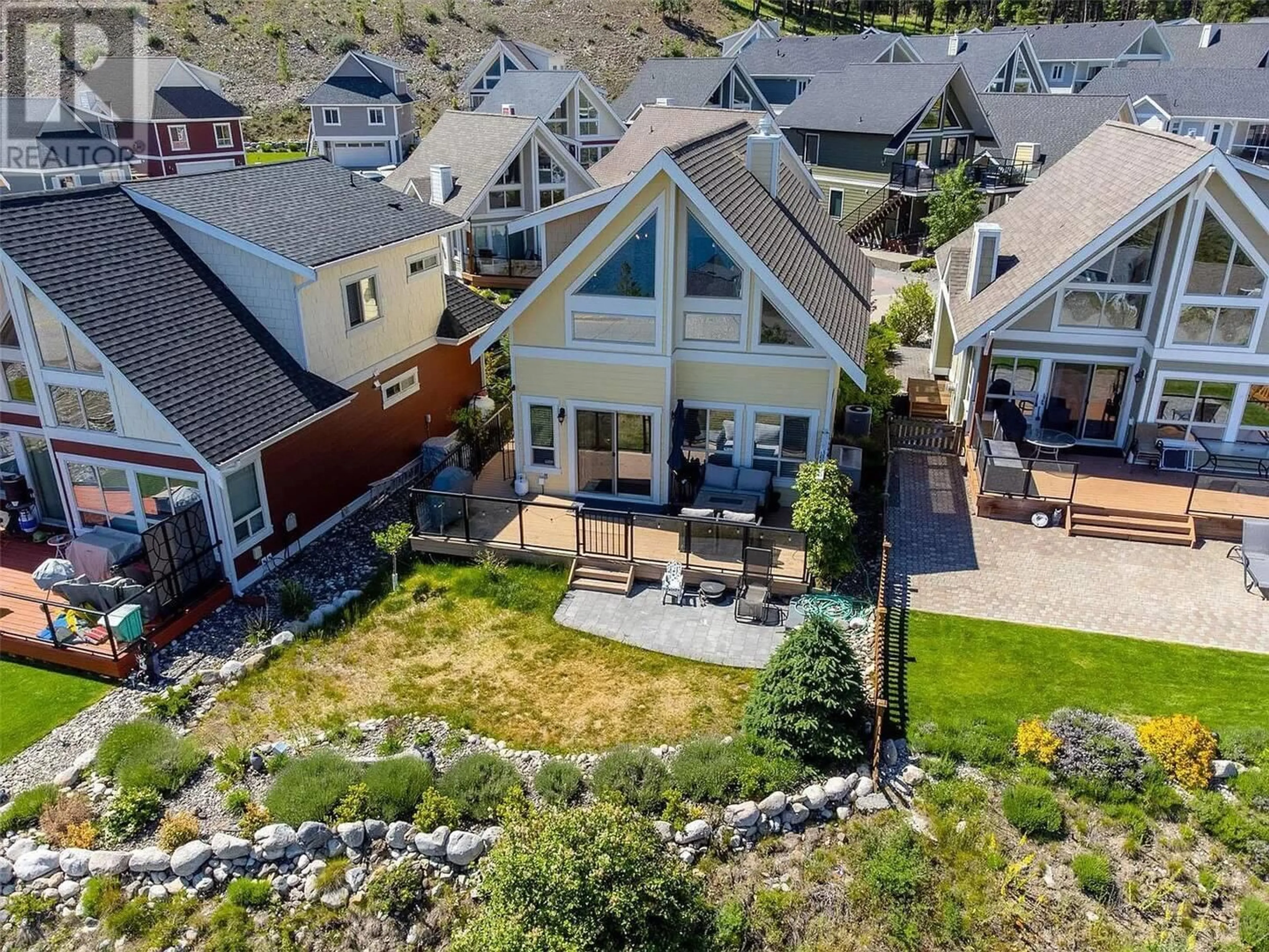 A pic from outside/outdoor area/front of a property/back of a property/a pic from drone, mountain view for 289 - 6716 MARBELLA LOOP, Kelowna British Columbia V1Z3R8