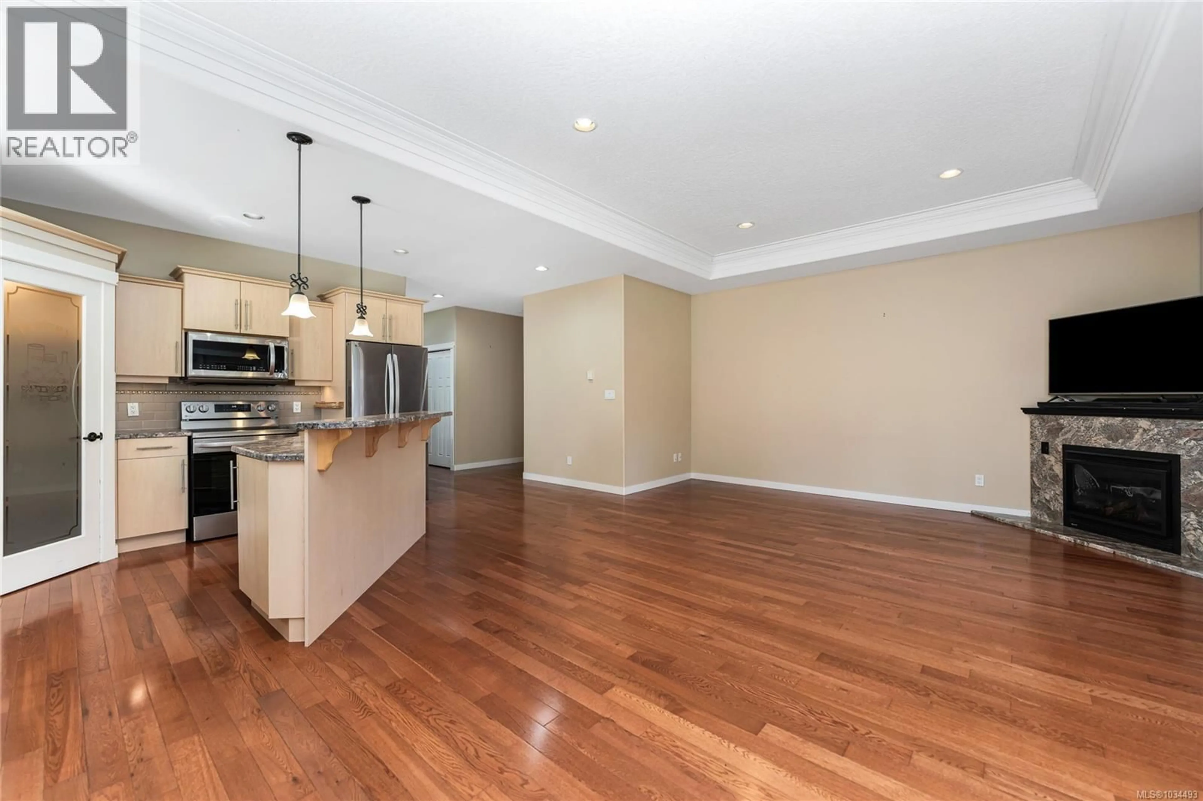 Open concept kitchen, wood/laminate floor for 3031 KEYSTONE DRIVE, Duncan British Columbia V9L0E1