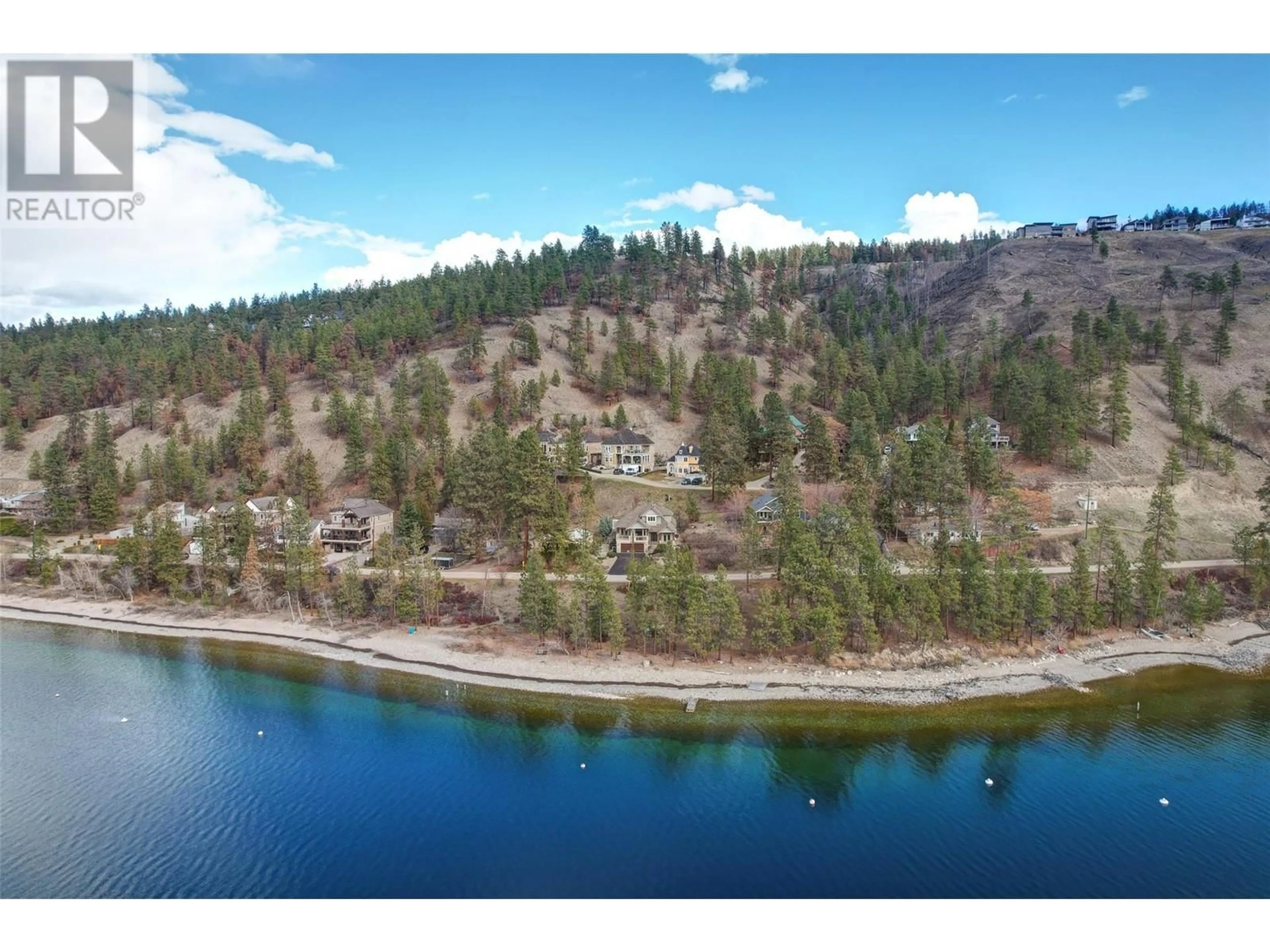 A pic from outside/outdoor area/front of a property/back of a property/a pic from drone, water/lake/river/ocean view for 10627 OKANAGAN CENTRE ROAD WEST, Lake Country British Columbia V4V2H8